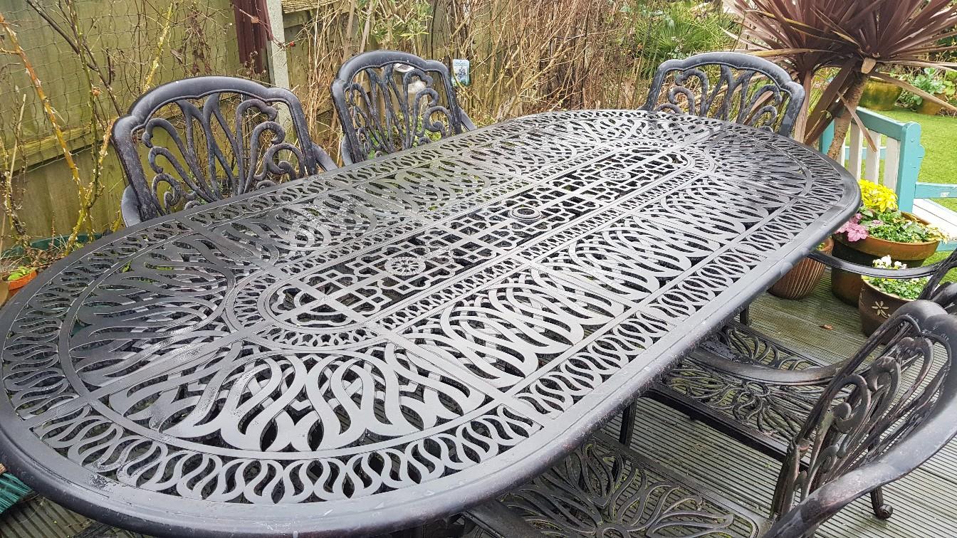 Garden table and 6 chairs - cast iron in Basildon for £250.00 for sale