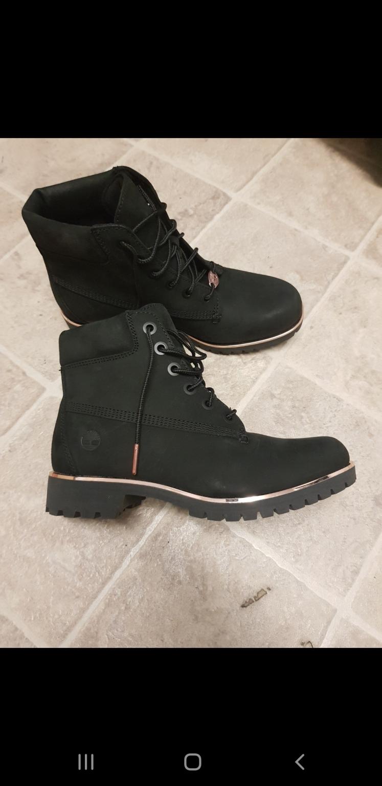 black and rose gold timberlands