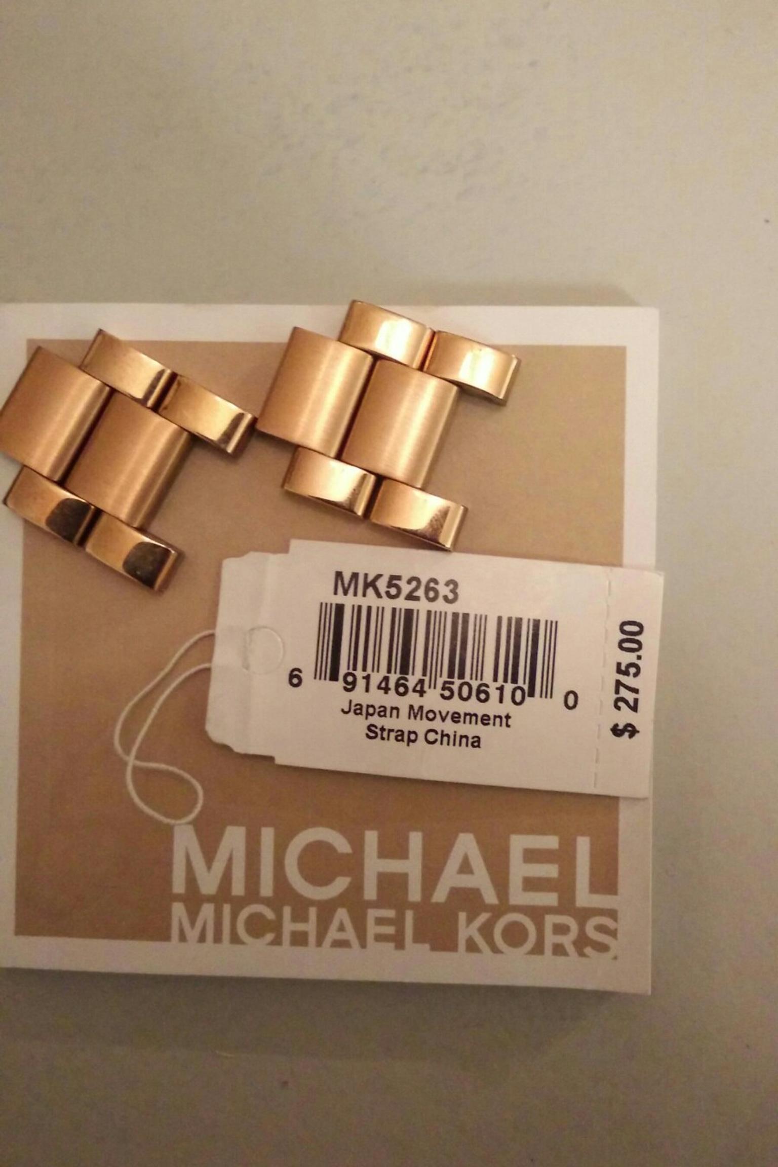 michael kors watches with mk logo inside