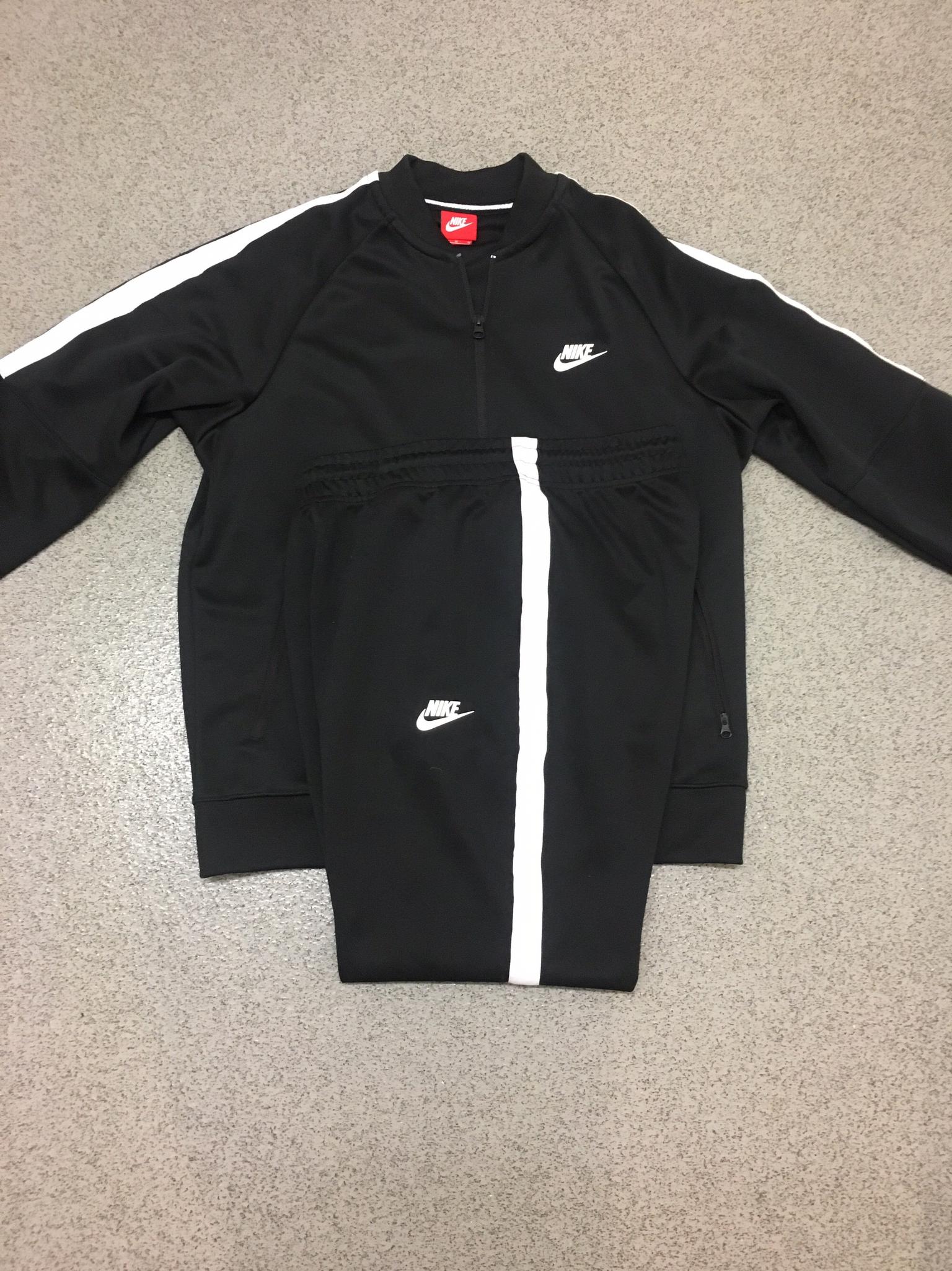 nike tracksuit mens black and white