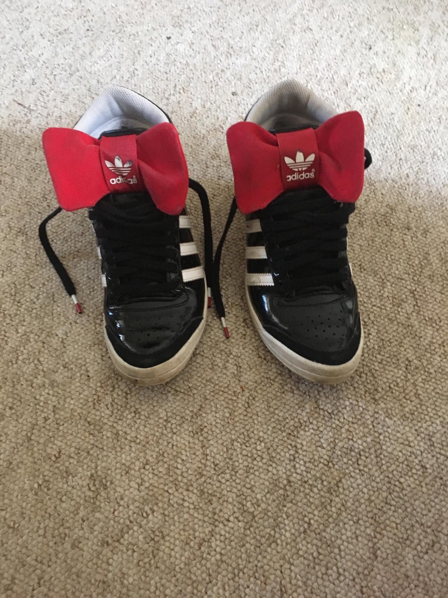 Adidas red bow trainers in SW2 Lambeth 