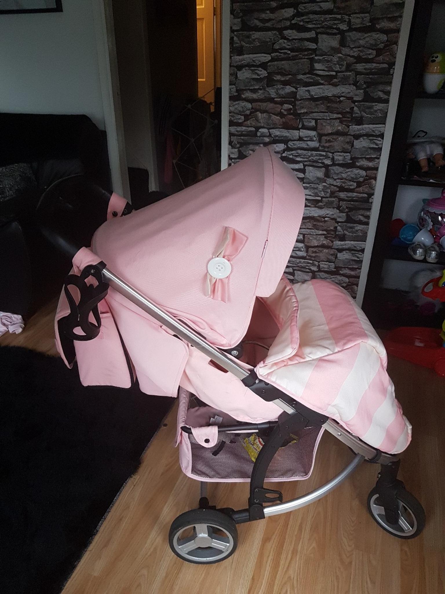 my babiie pink star pushchair