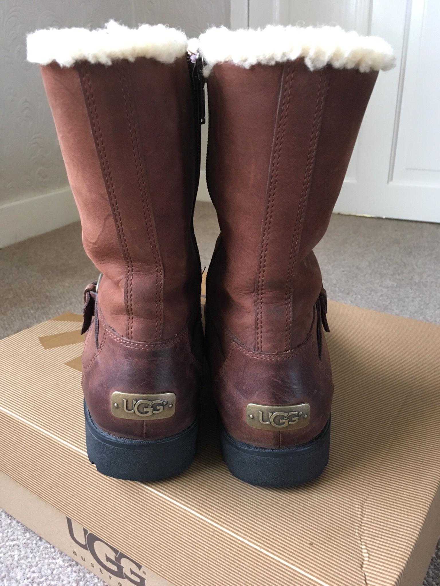 ugg boots with metal logo