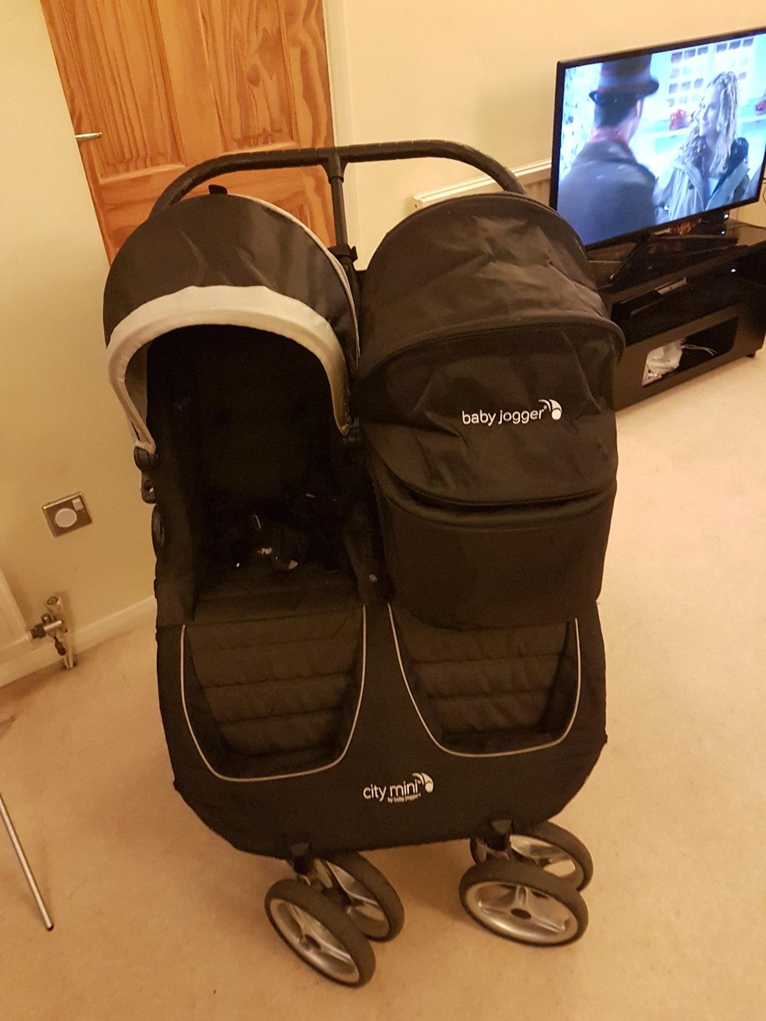 city jogger double carrycot