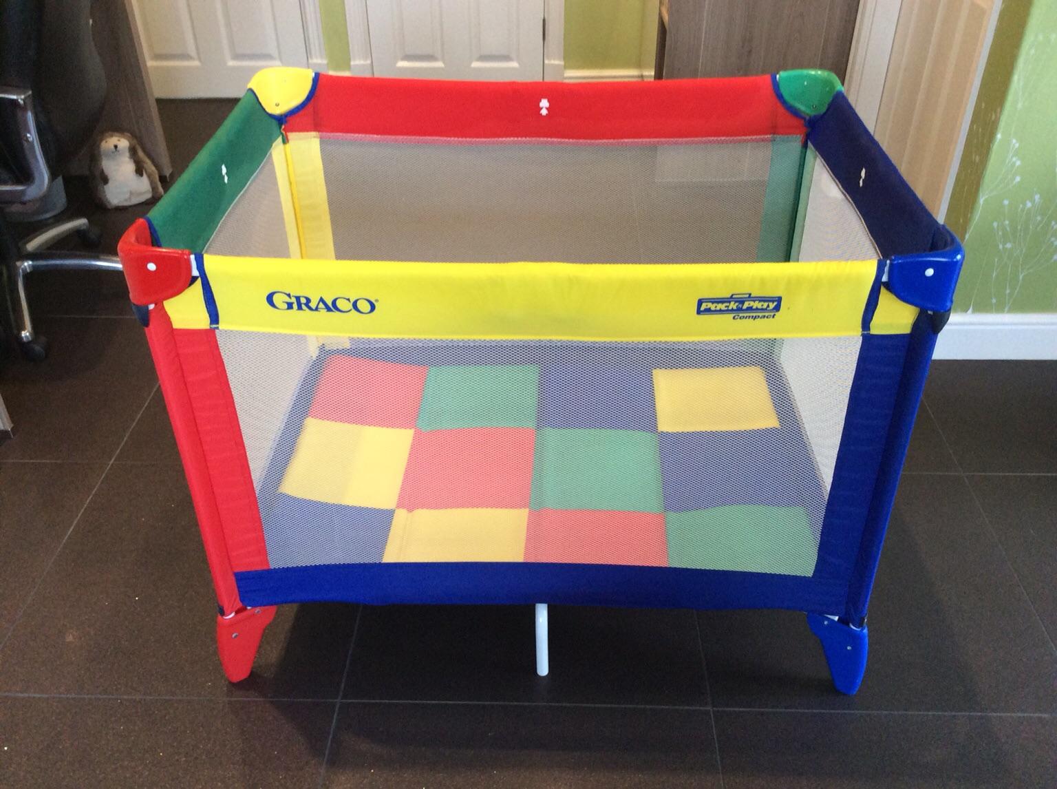 graco travel cot pack and play