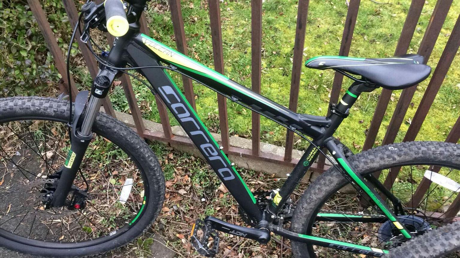 black and green carrera bike