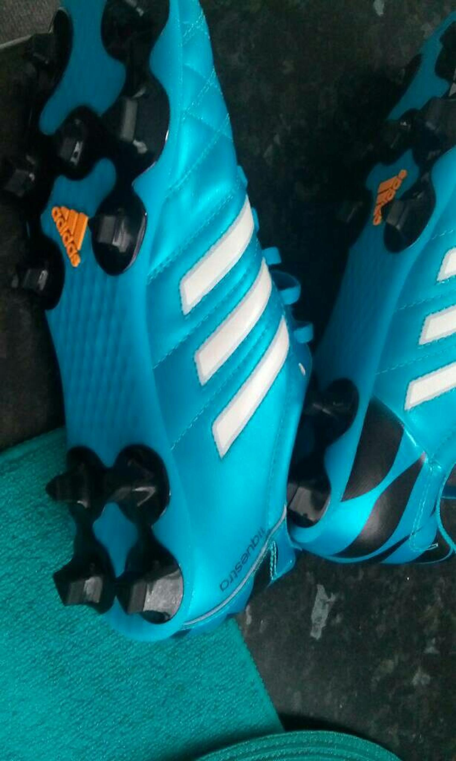 size 15 football boots