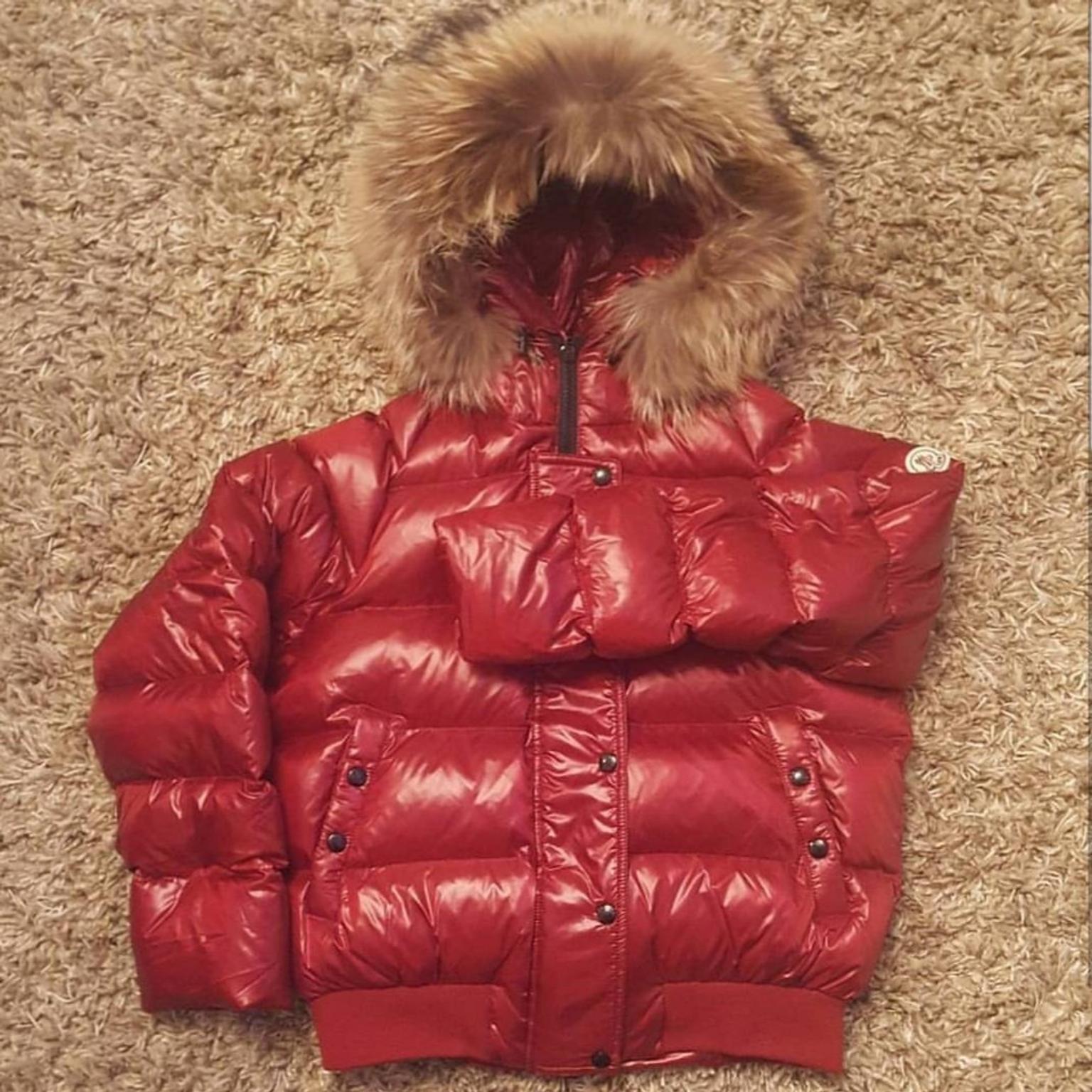 red moncler jacket with fur hood
