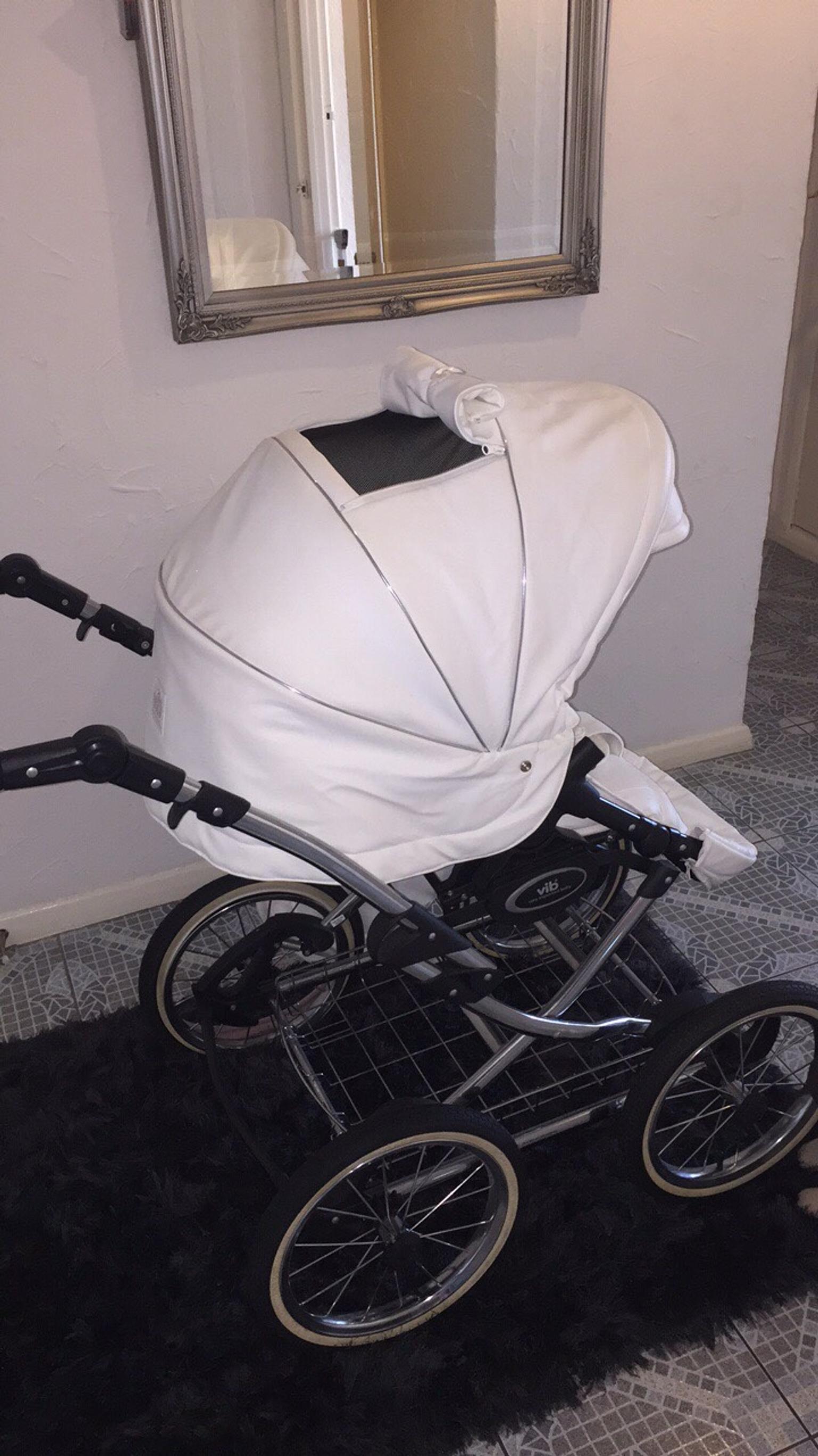 white leather pram with crystals