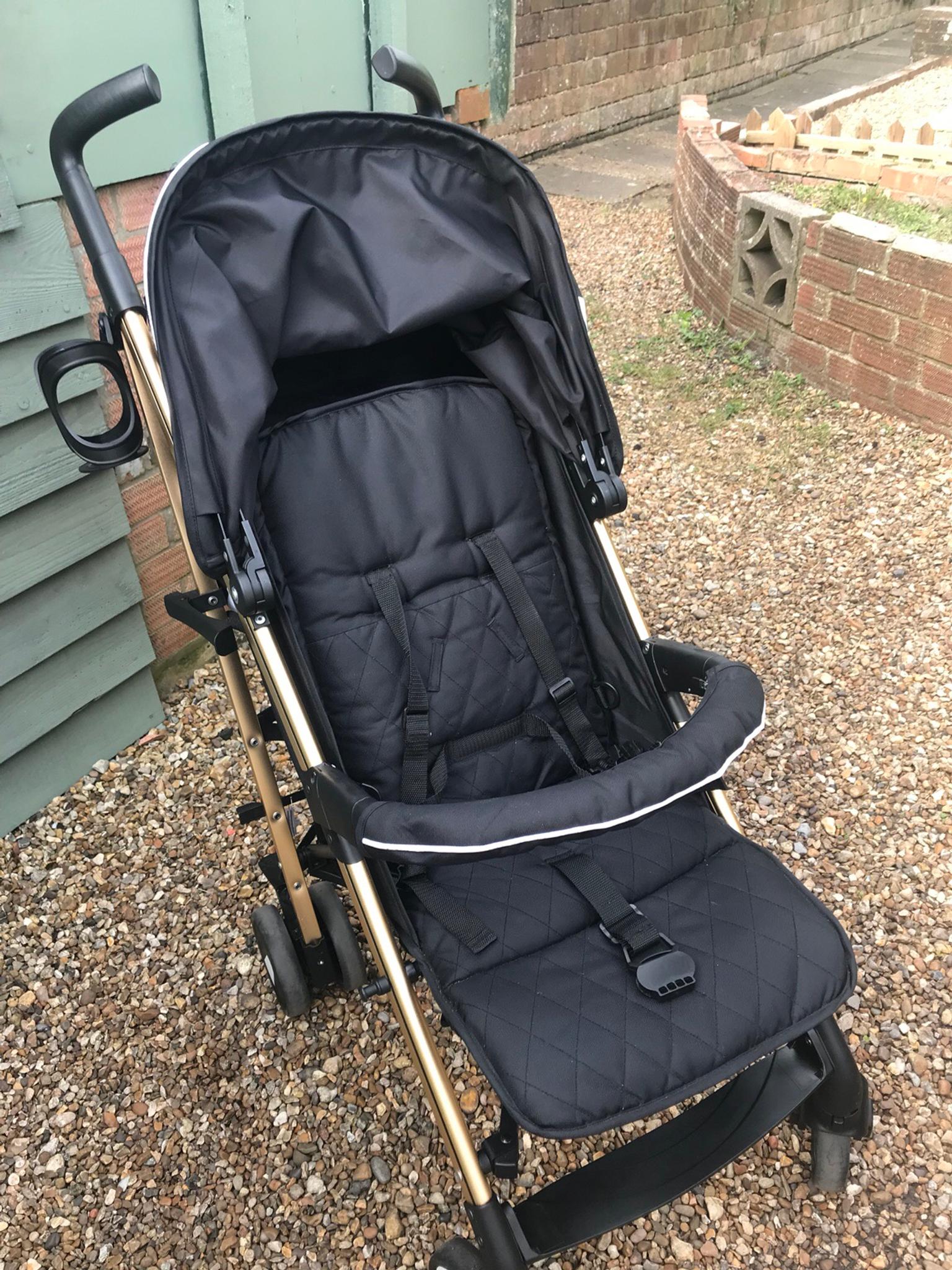 my babiie black and gold stroller