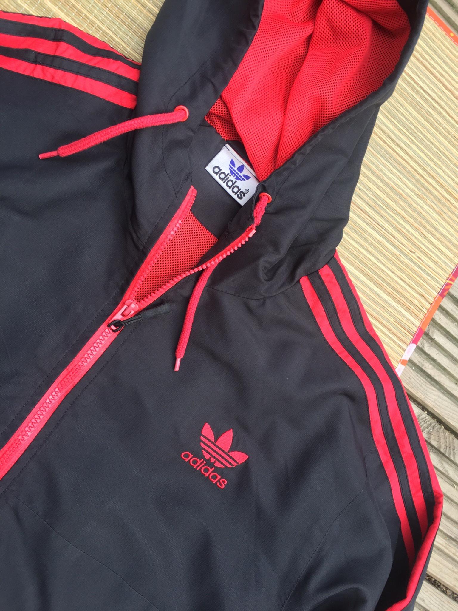 black and red adidas tracksuit