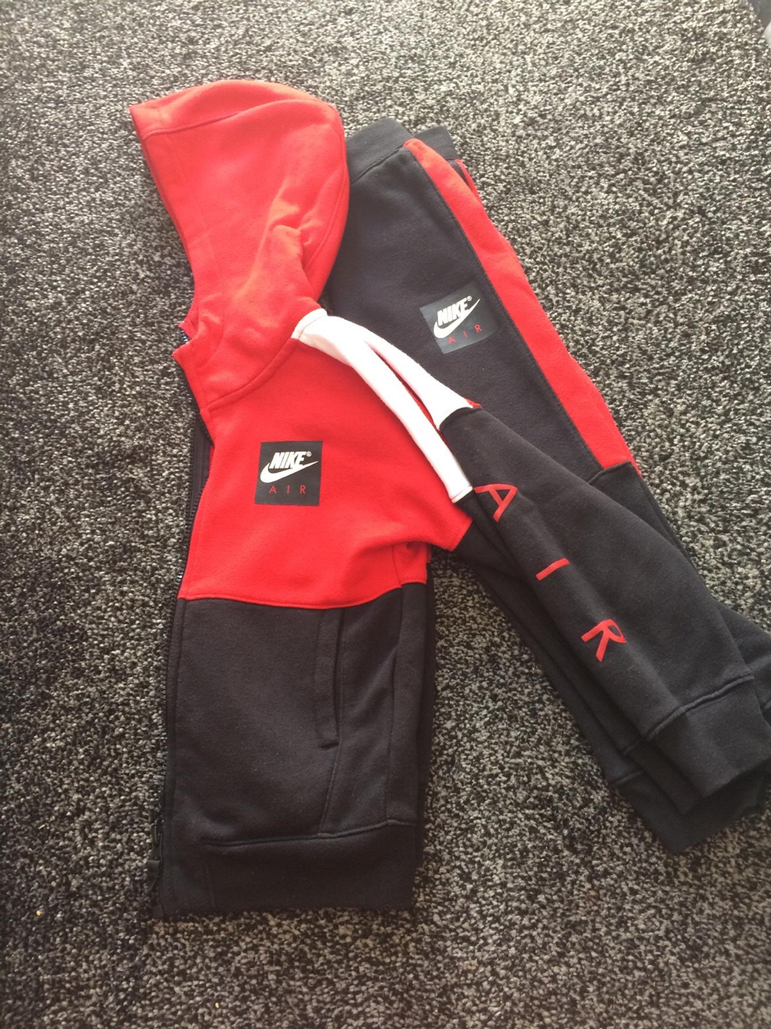 nike air tracksuit red