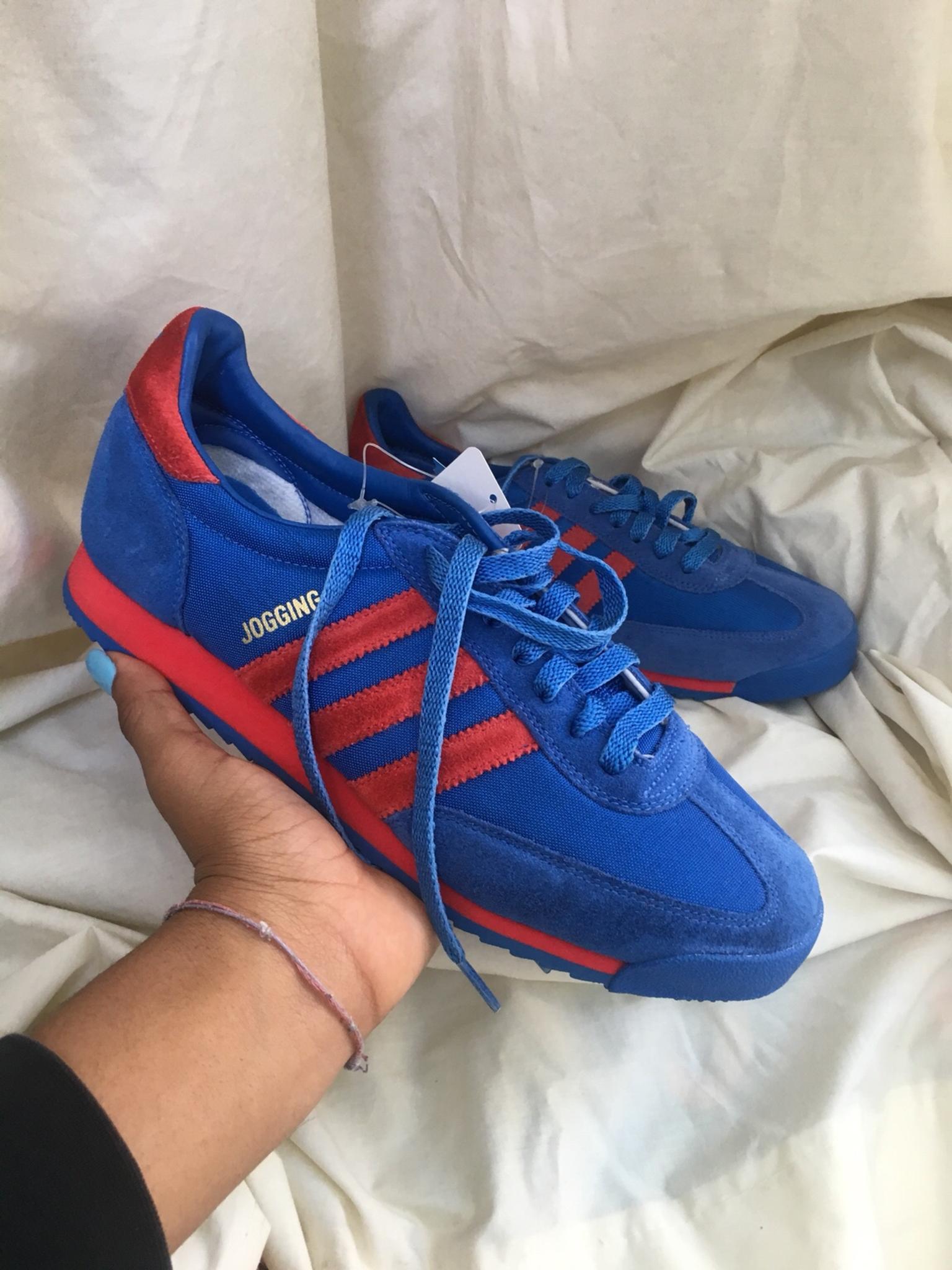 adidas blue and red trainers