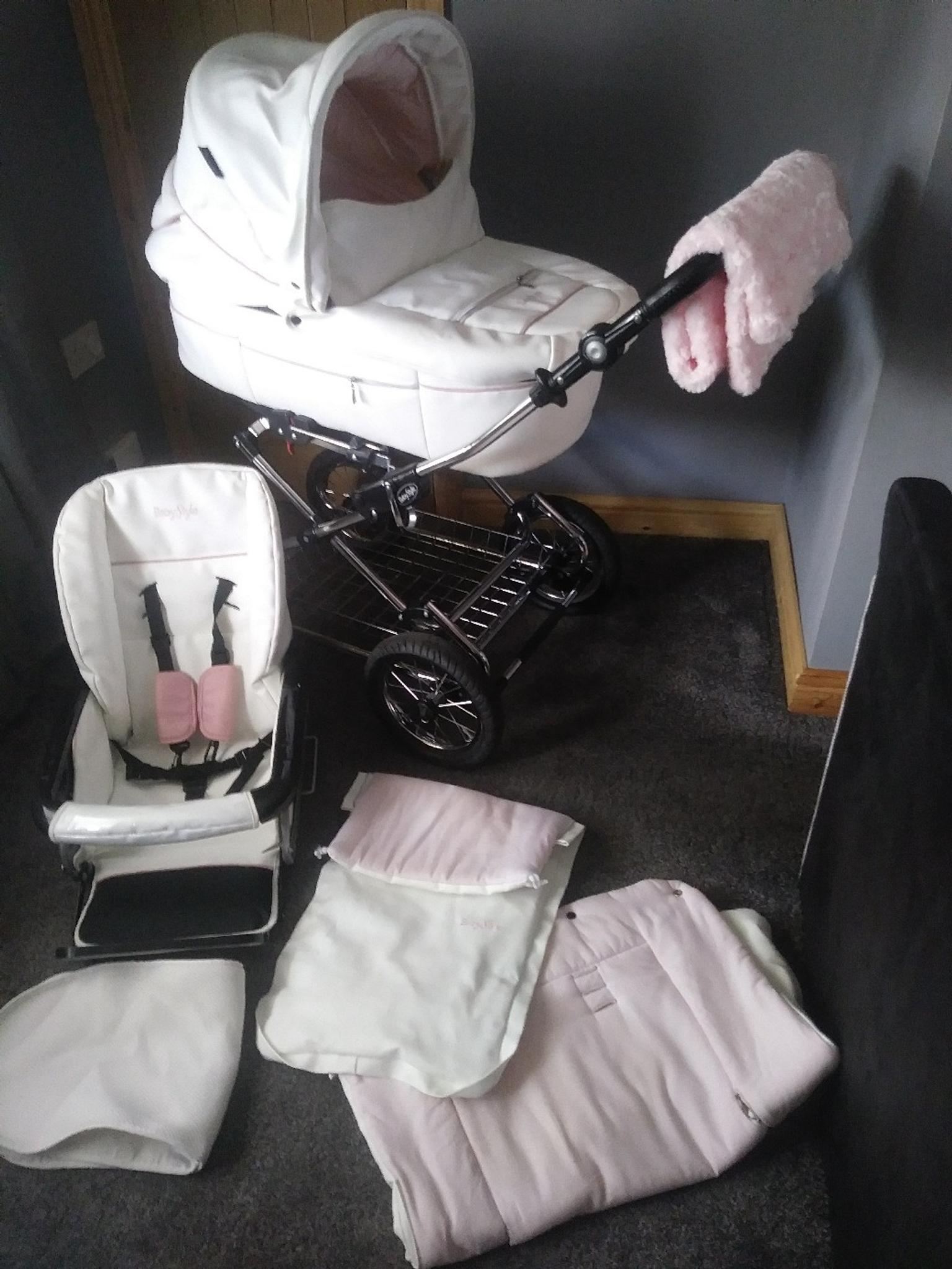 babystyle pink and white leather pram