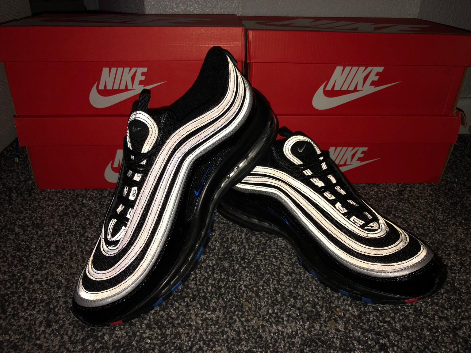 black 97s with blue tick