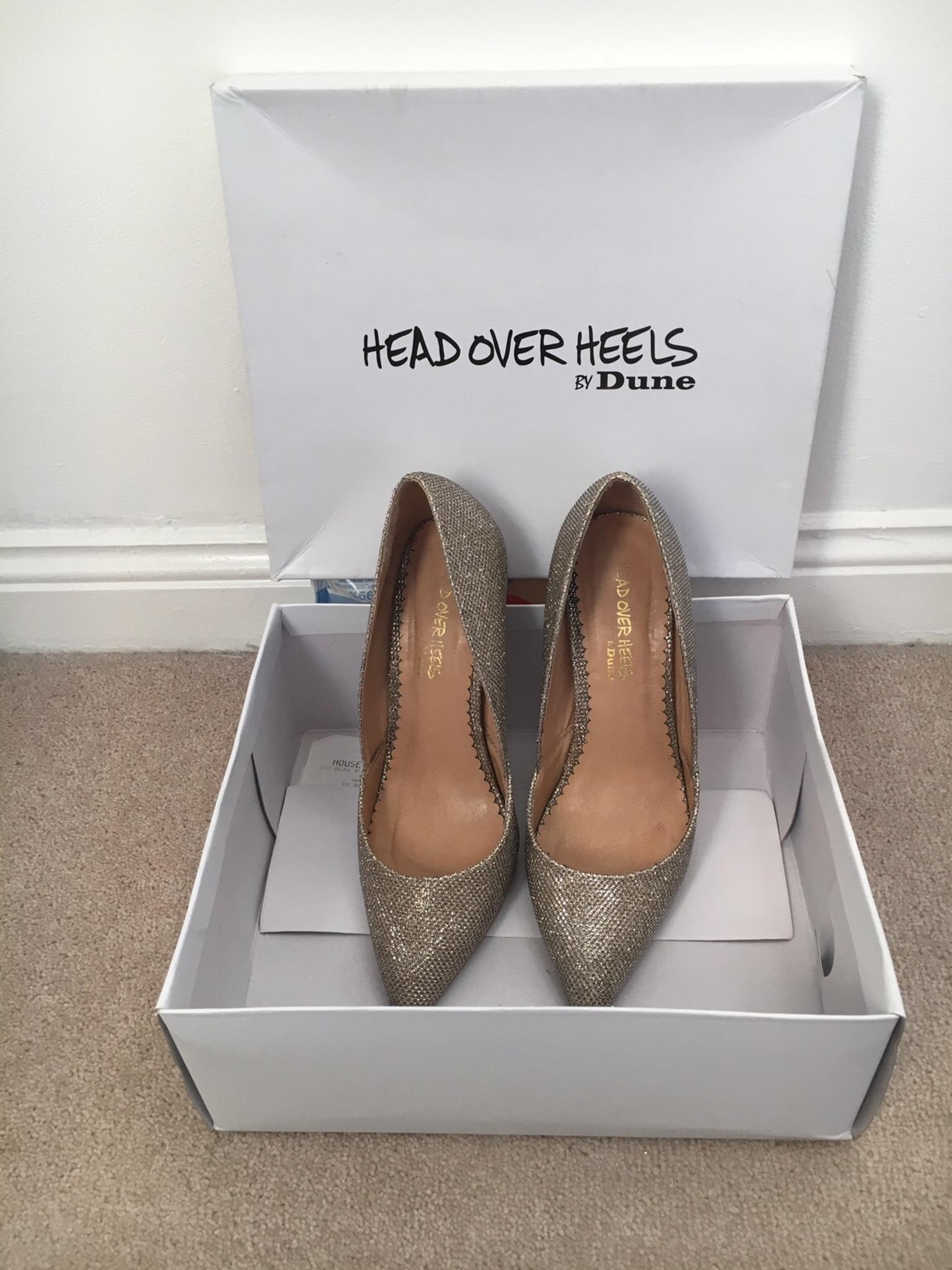 head over heels gold shoes