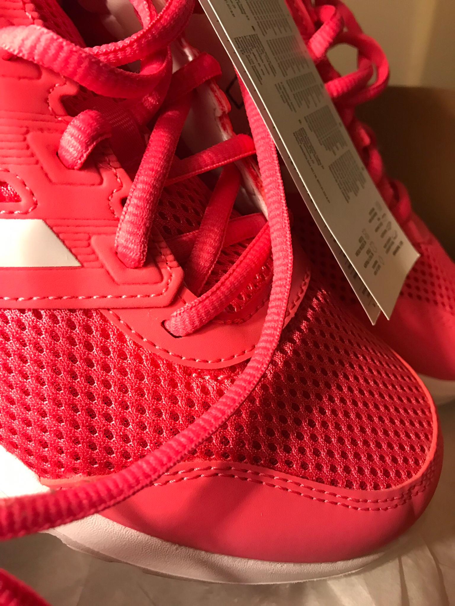 bright pink adidas trainers