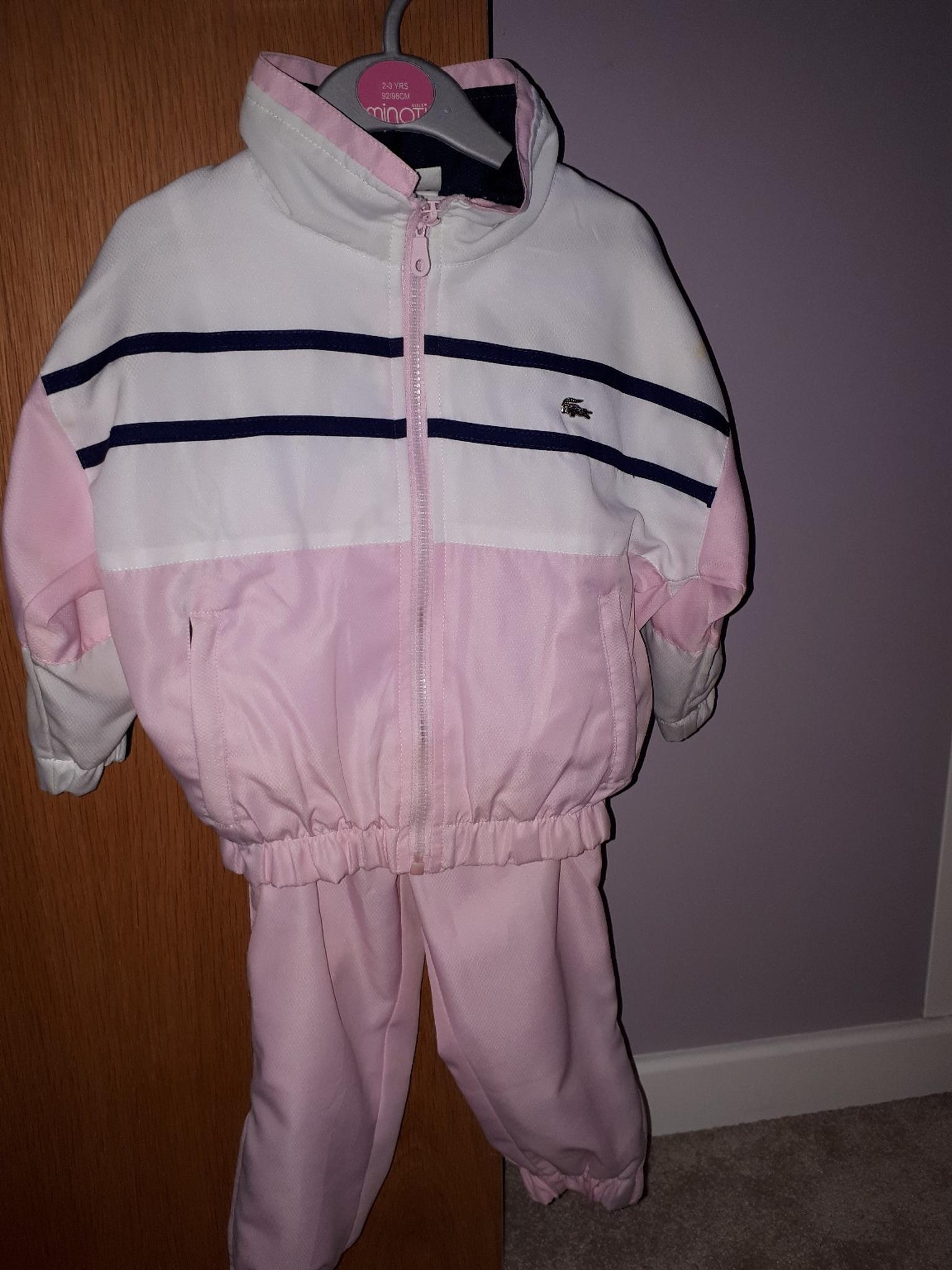 pink lacoste tracksuit