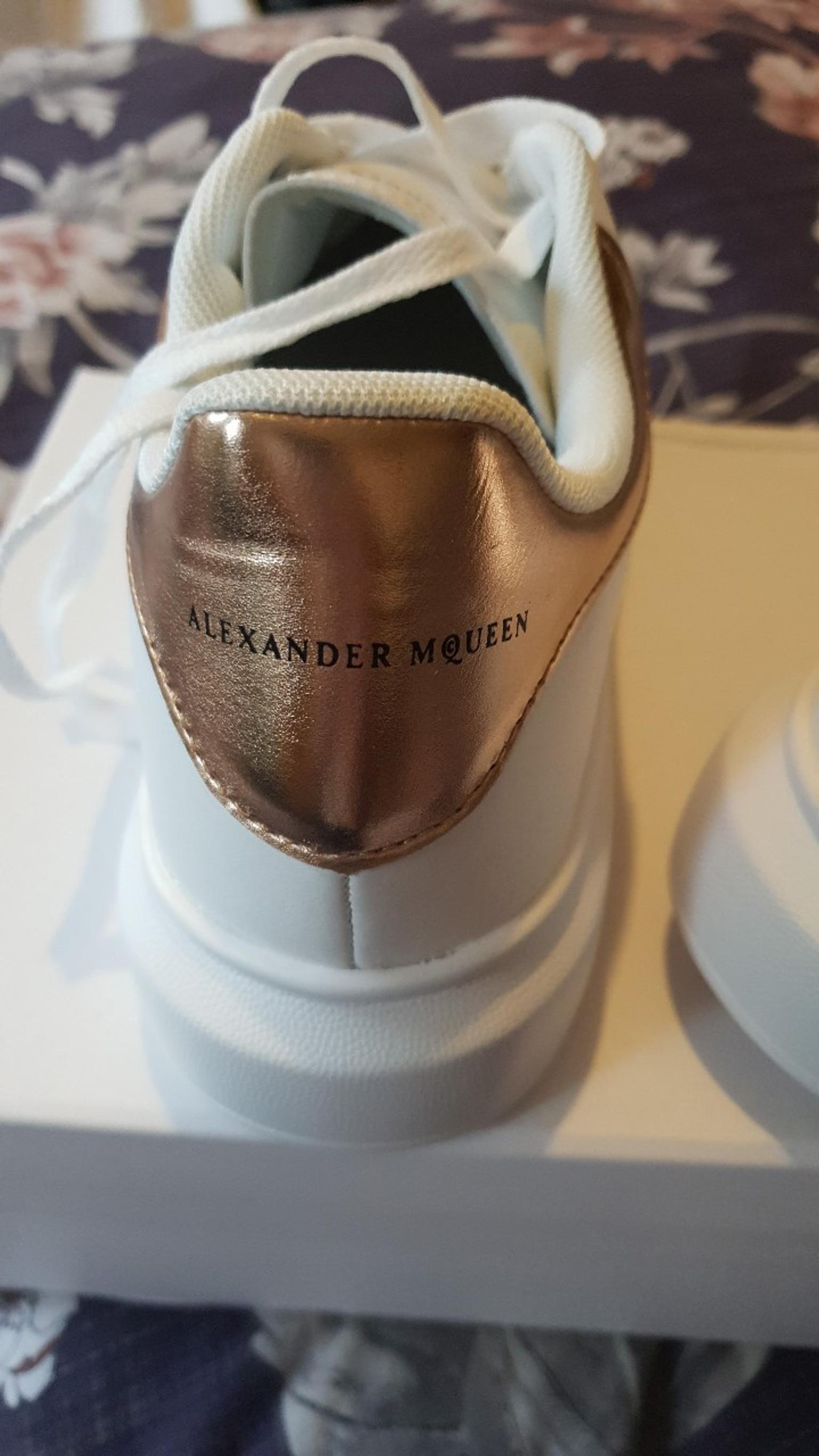 alexander mcqueen trainers white and gold