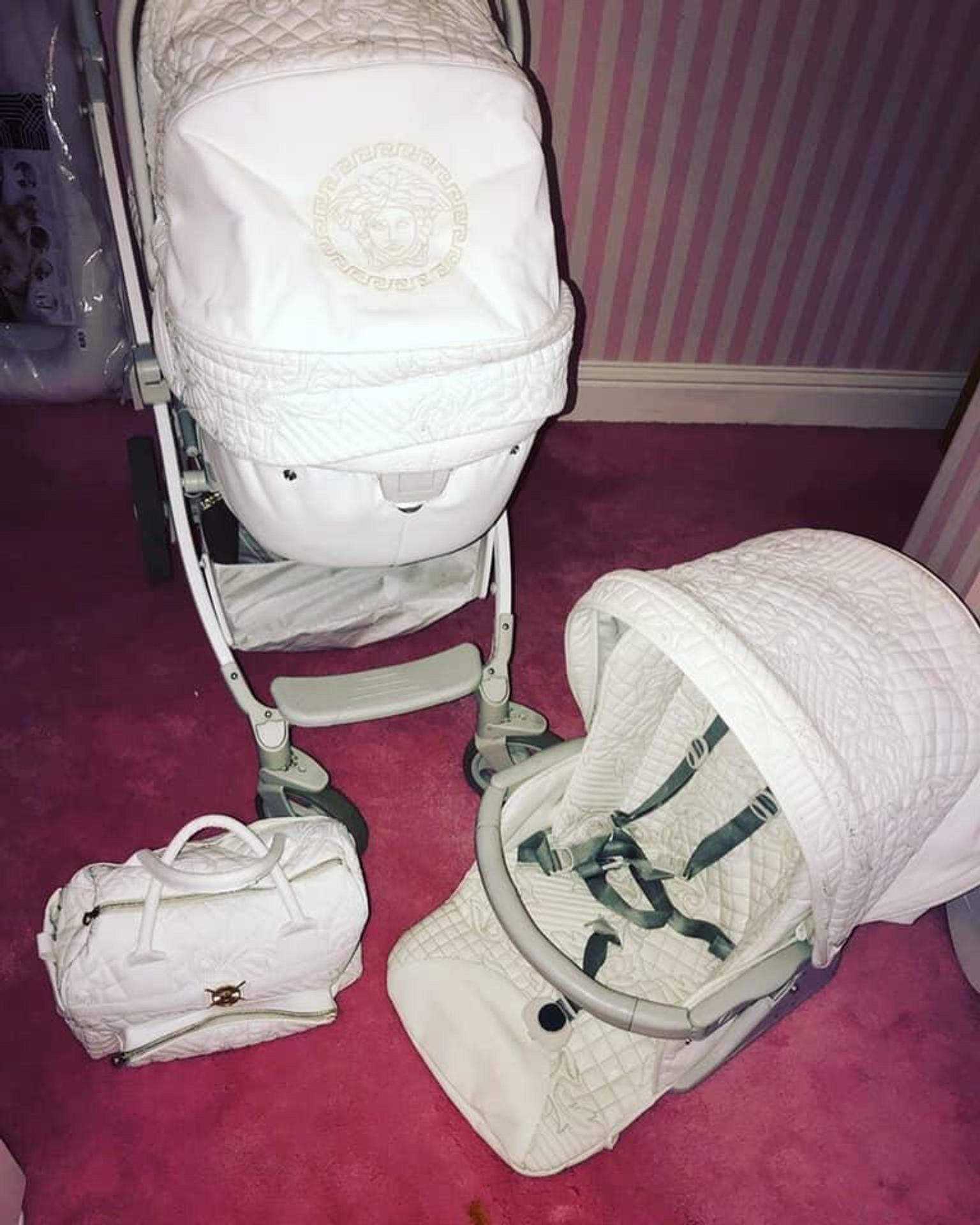 young versace stroller white