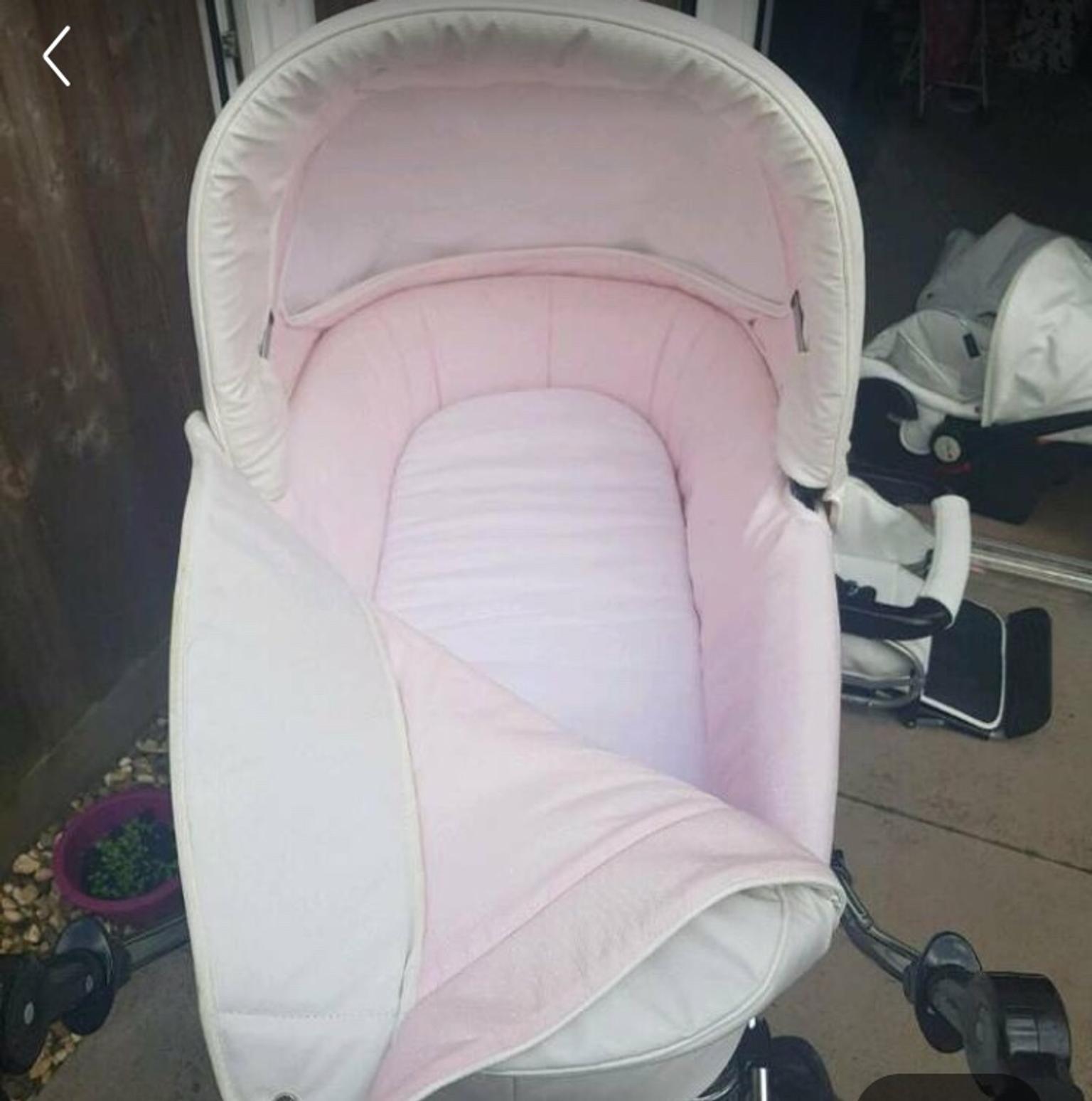 babystyle pink and white leather pram