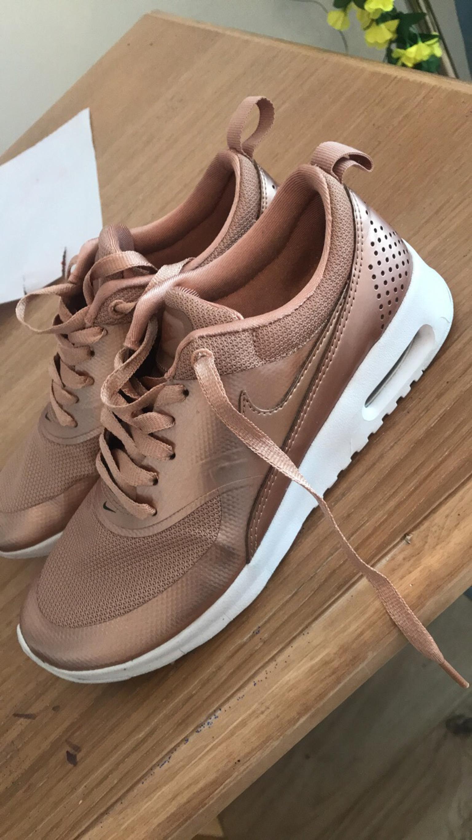 ladies rose gold nike trainers