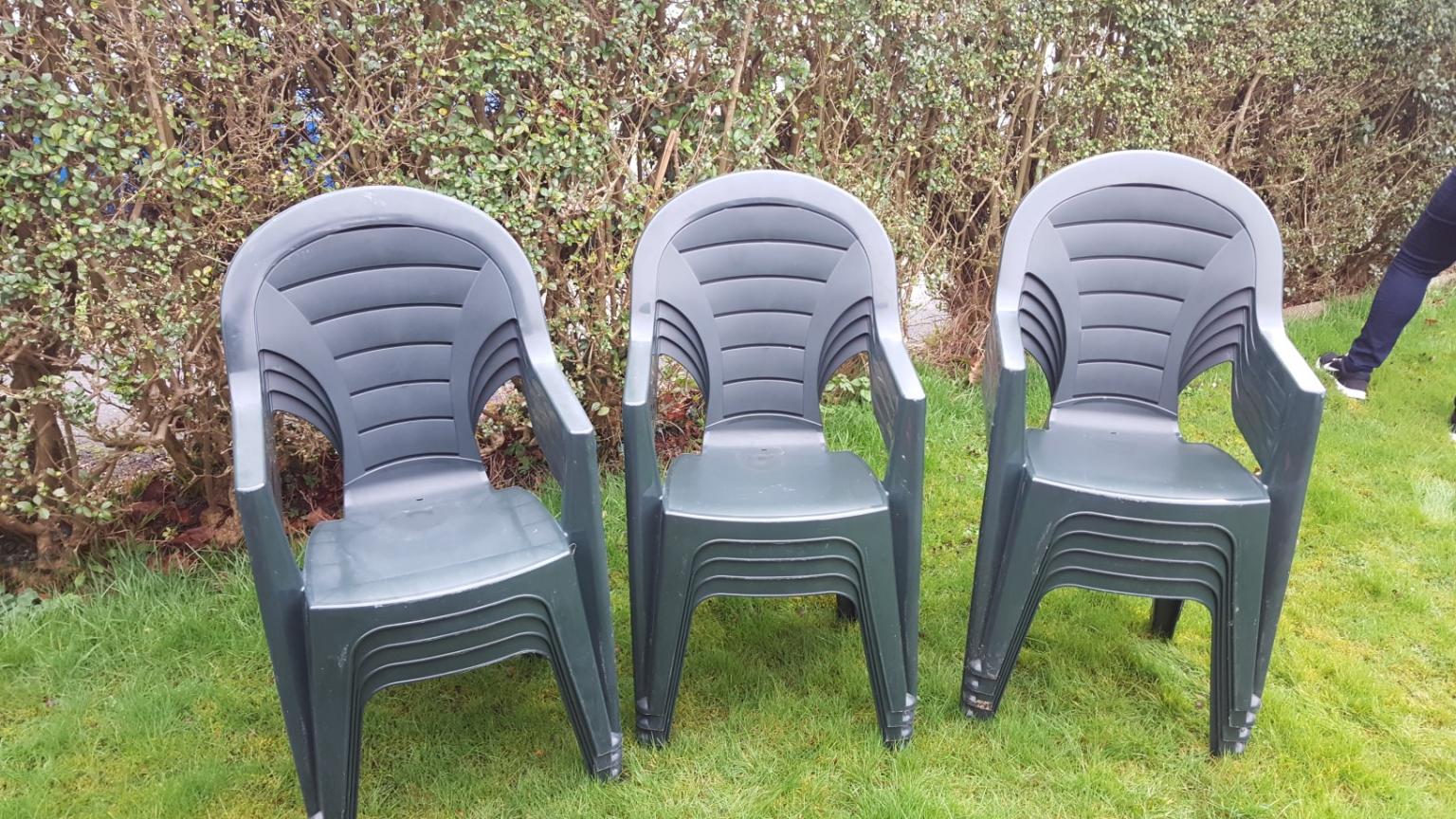 Green plastic garden chairs in KT6 London for £3.00 for