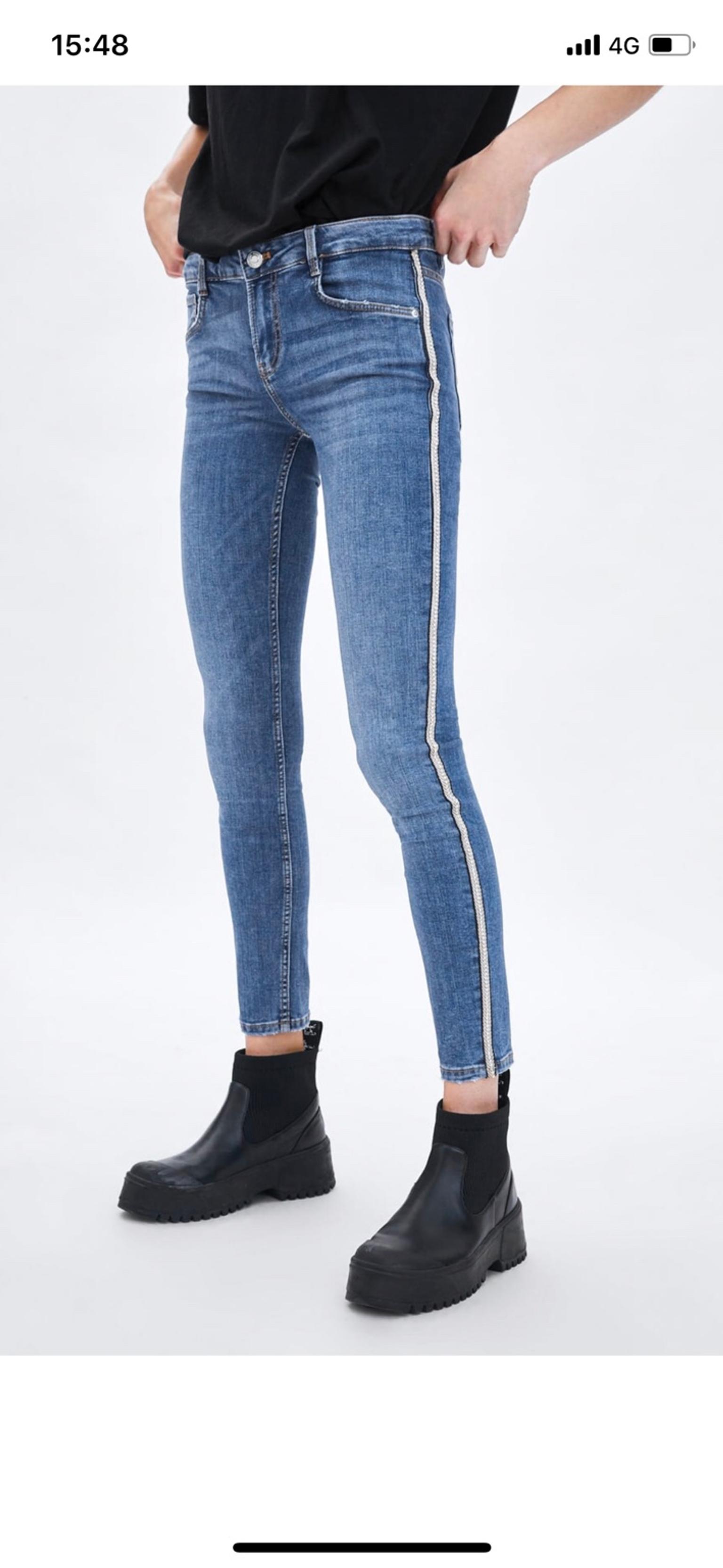 zara jeans with stripe on side
