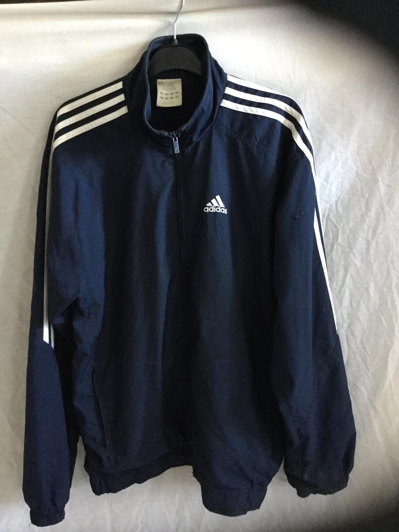 adidas tracksuit with logo on the back