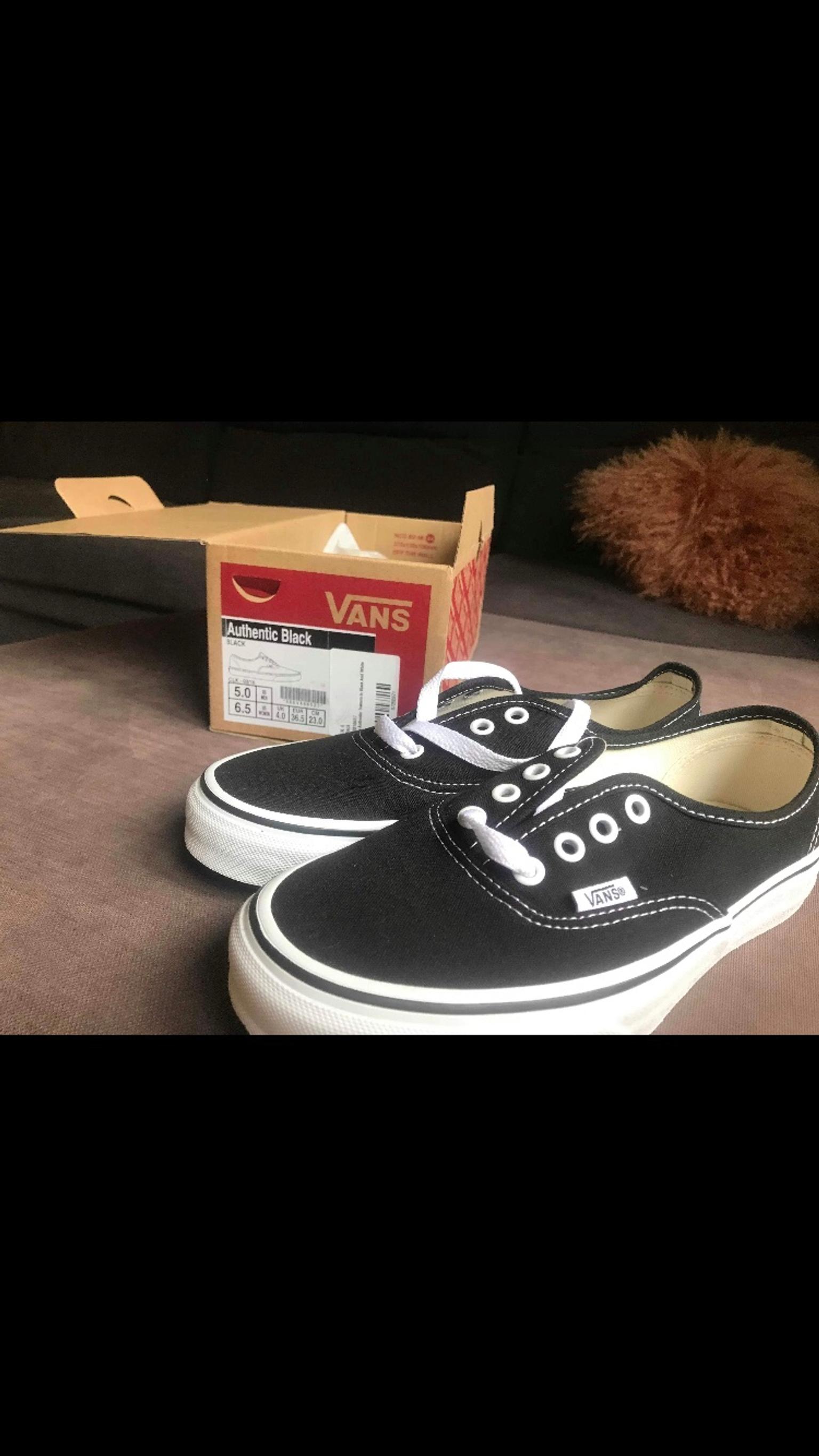black authentic vans size 4