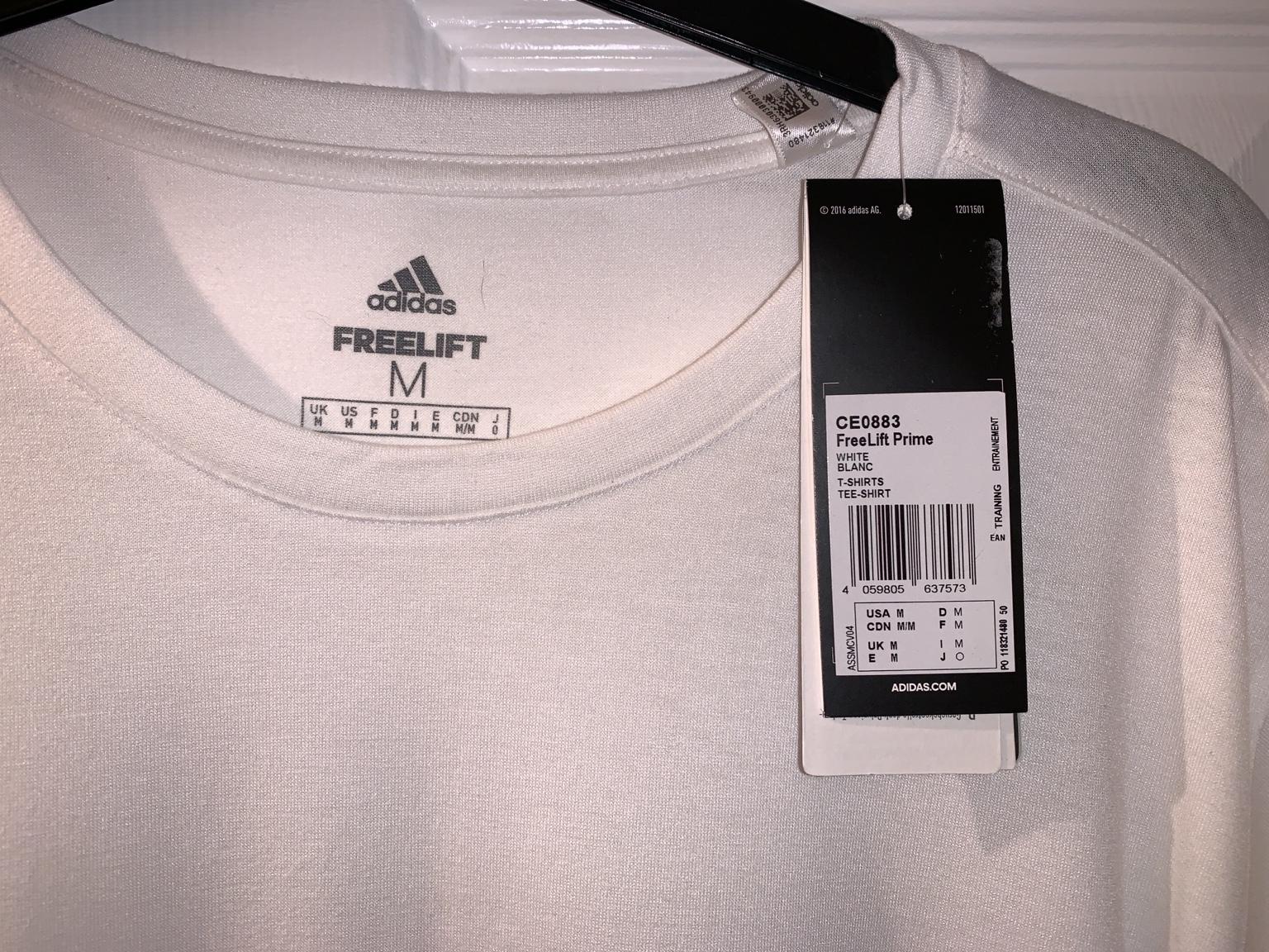 adidas price tag shirt