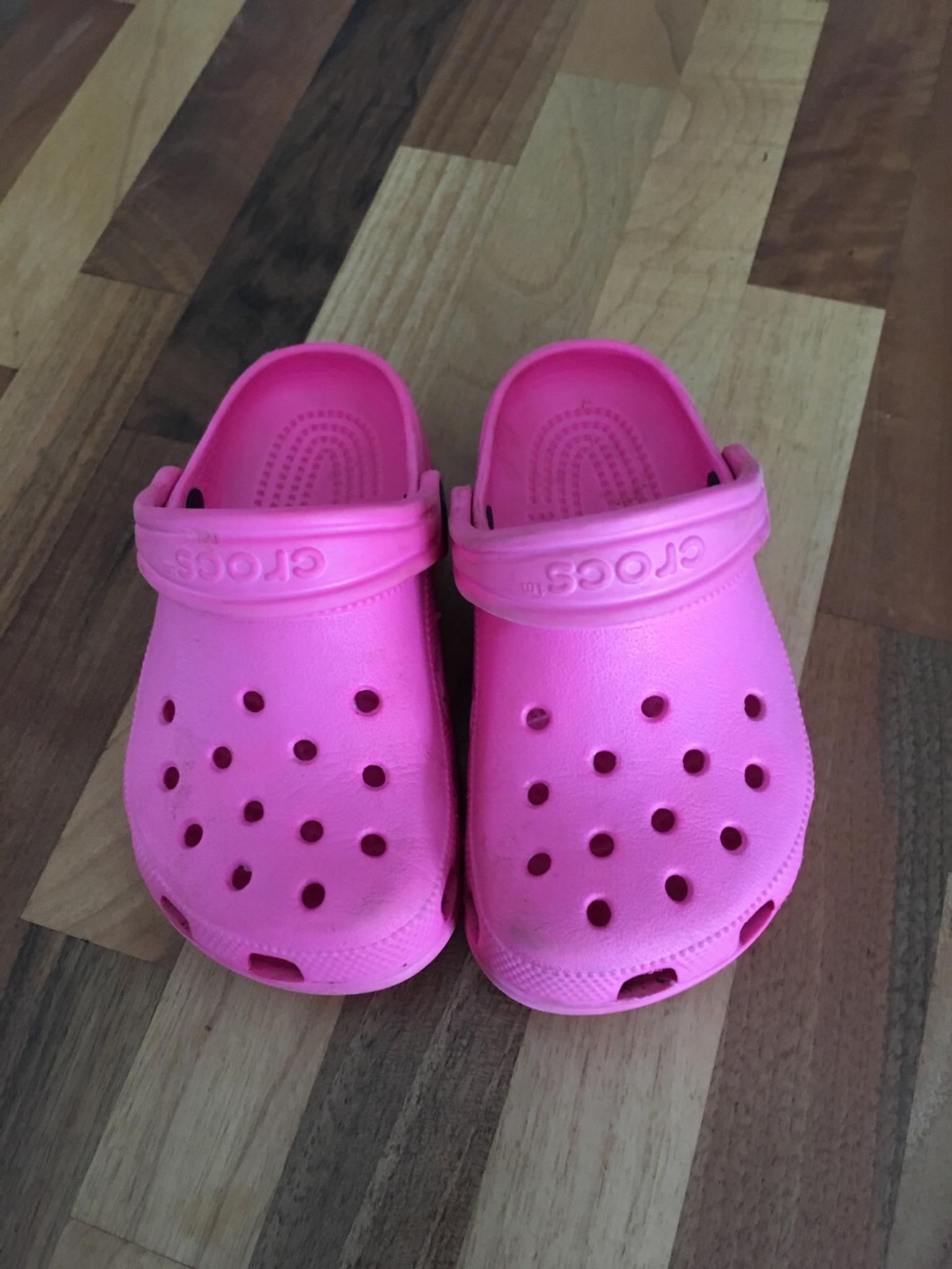 pink crocs size 9