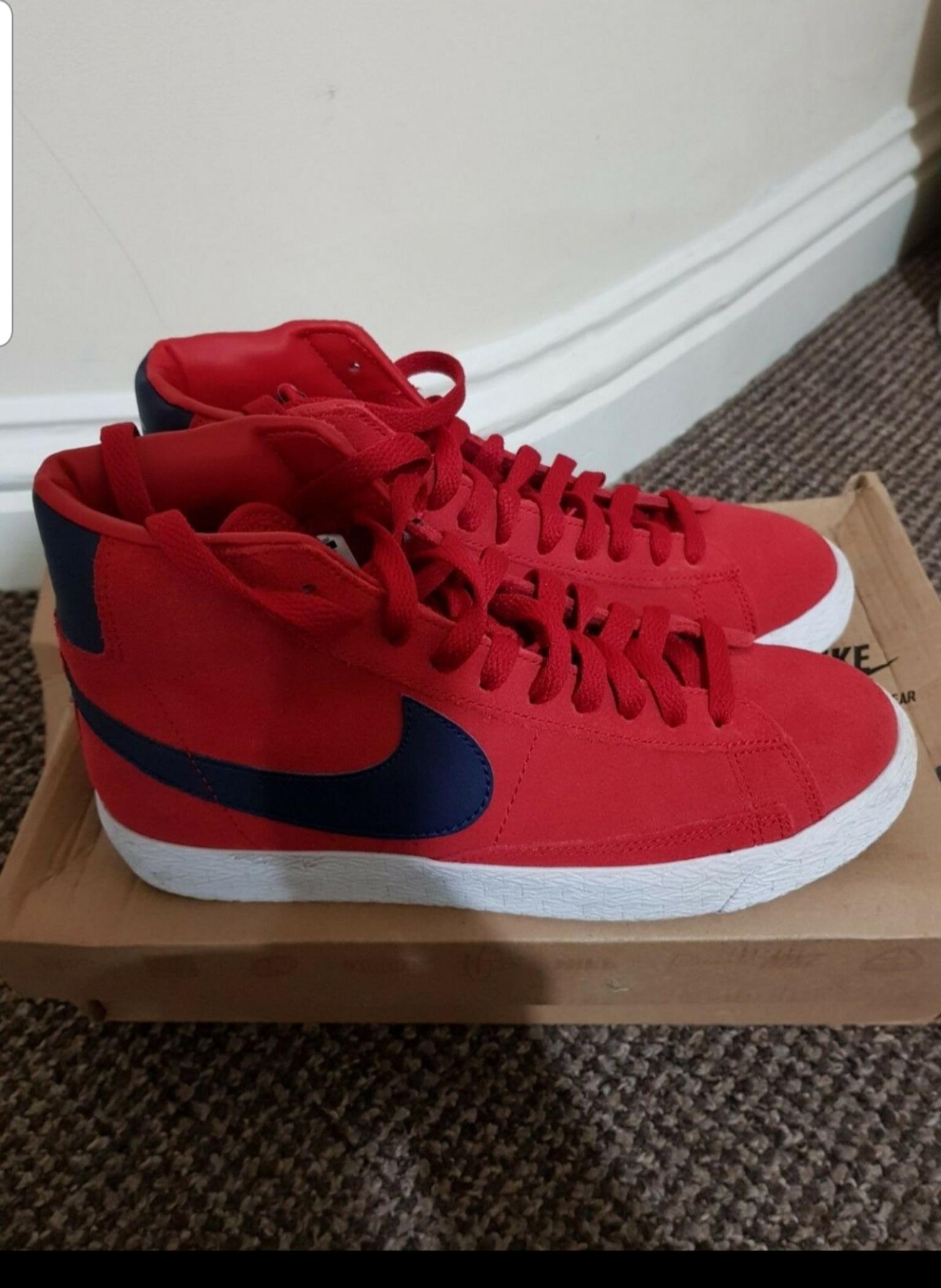 red and blue nike blazers