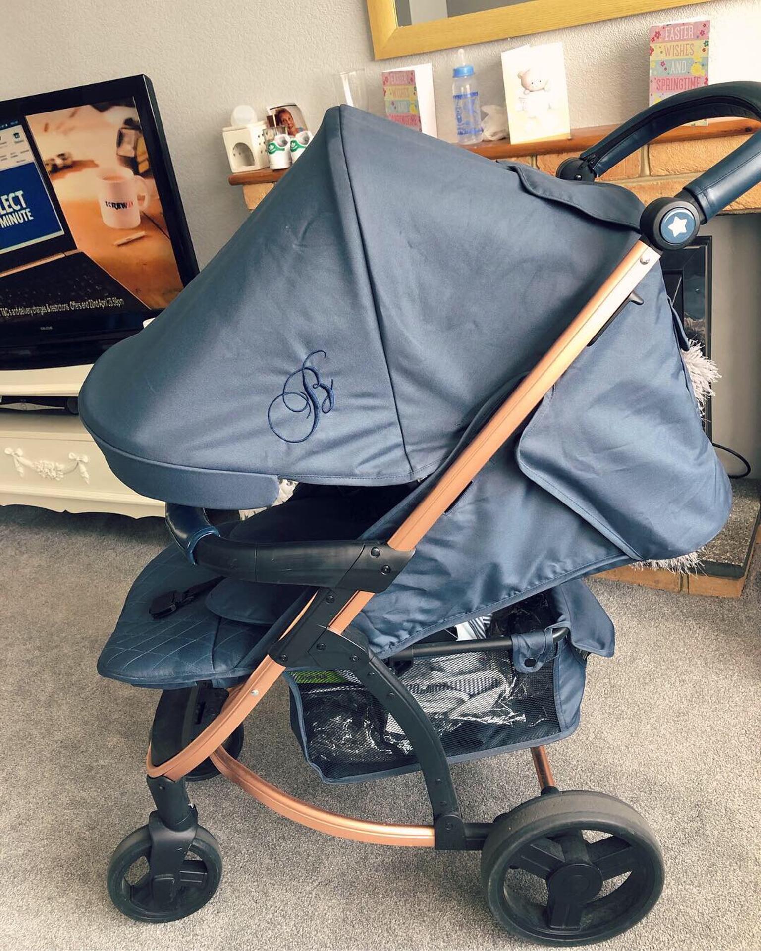 my babiie navy and rose gold travel system