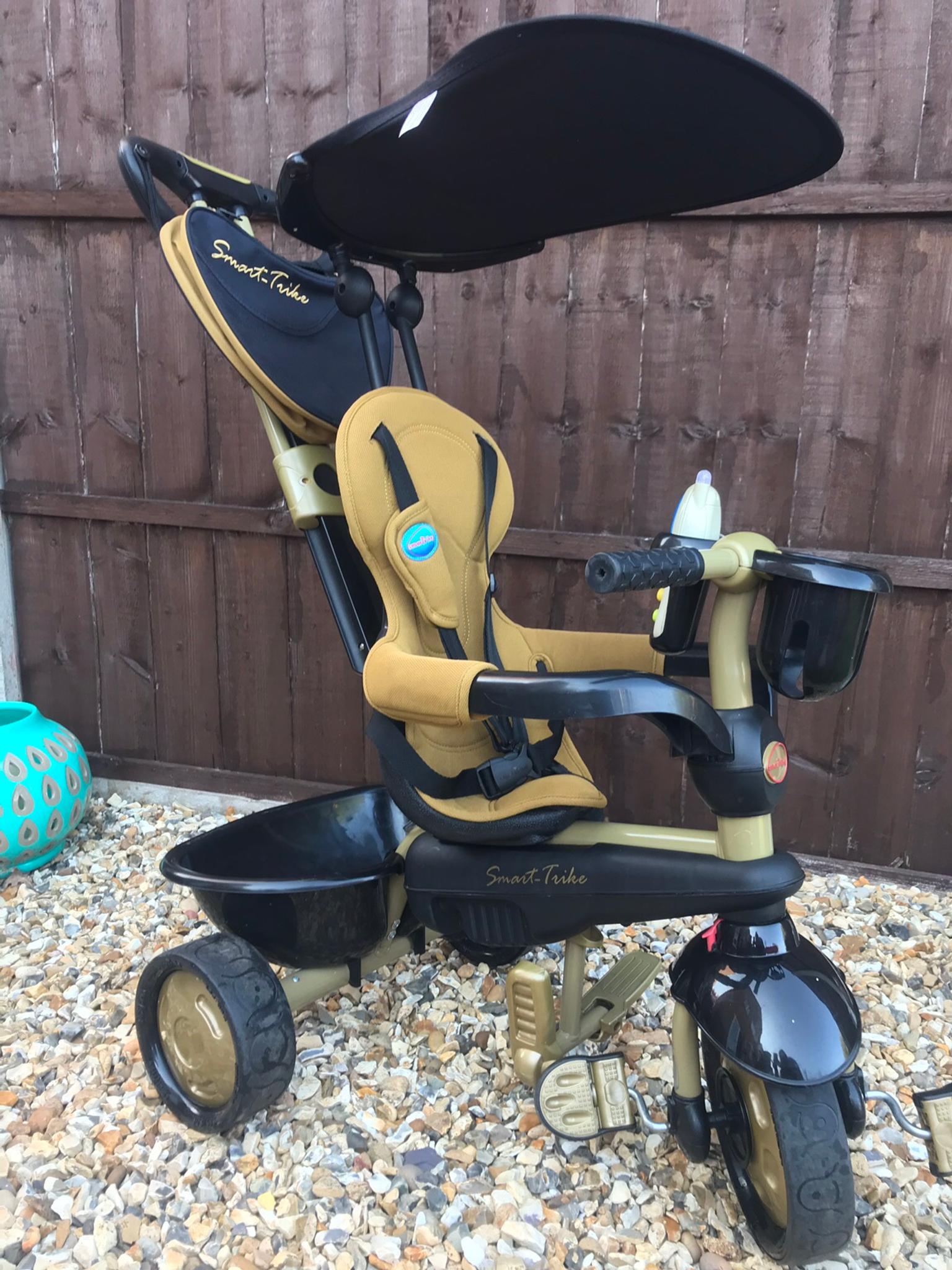 smart trike black and gold
