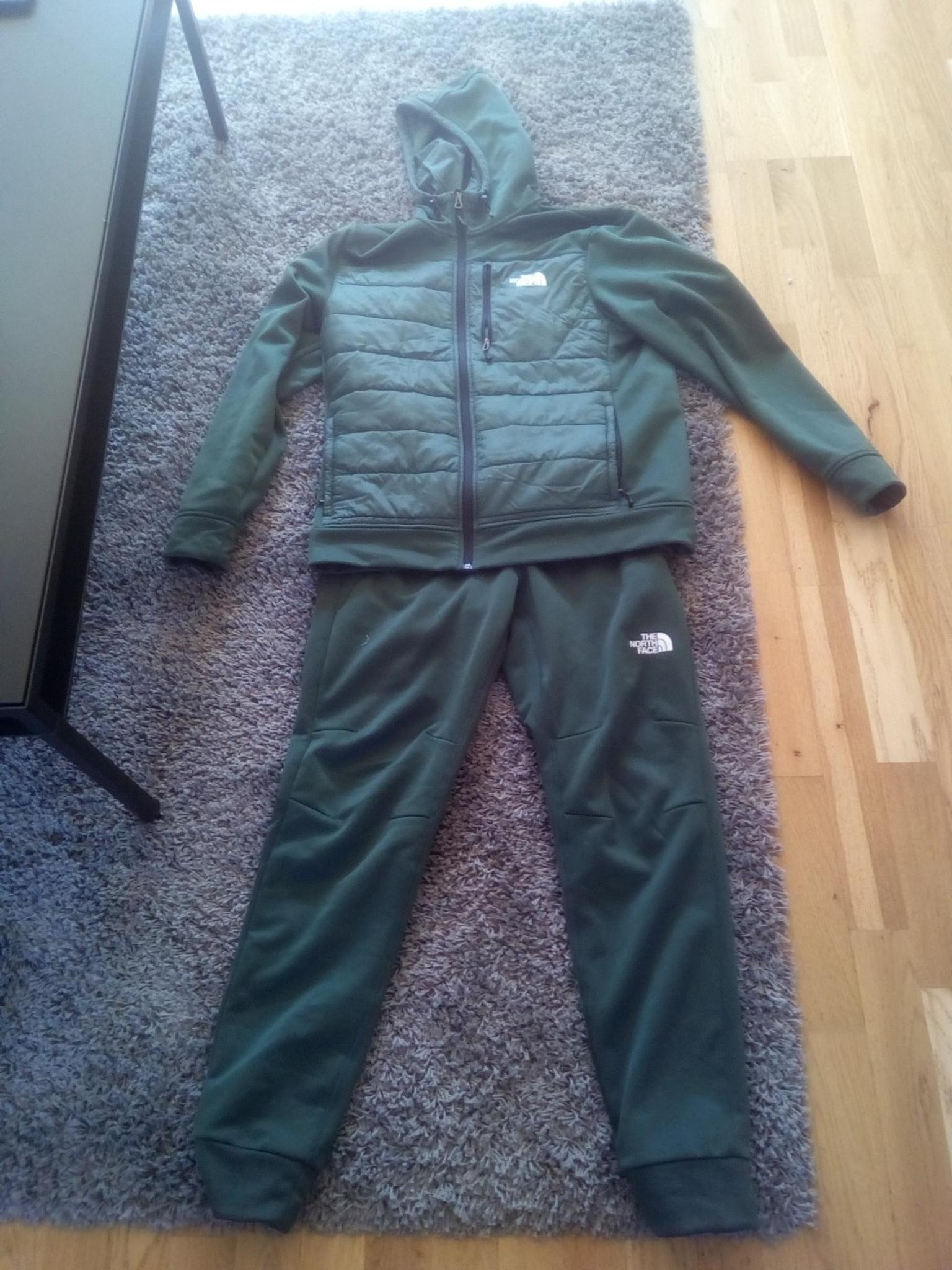 green north face tracksuit mens