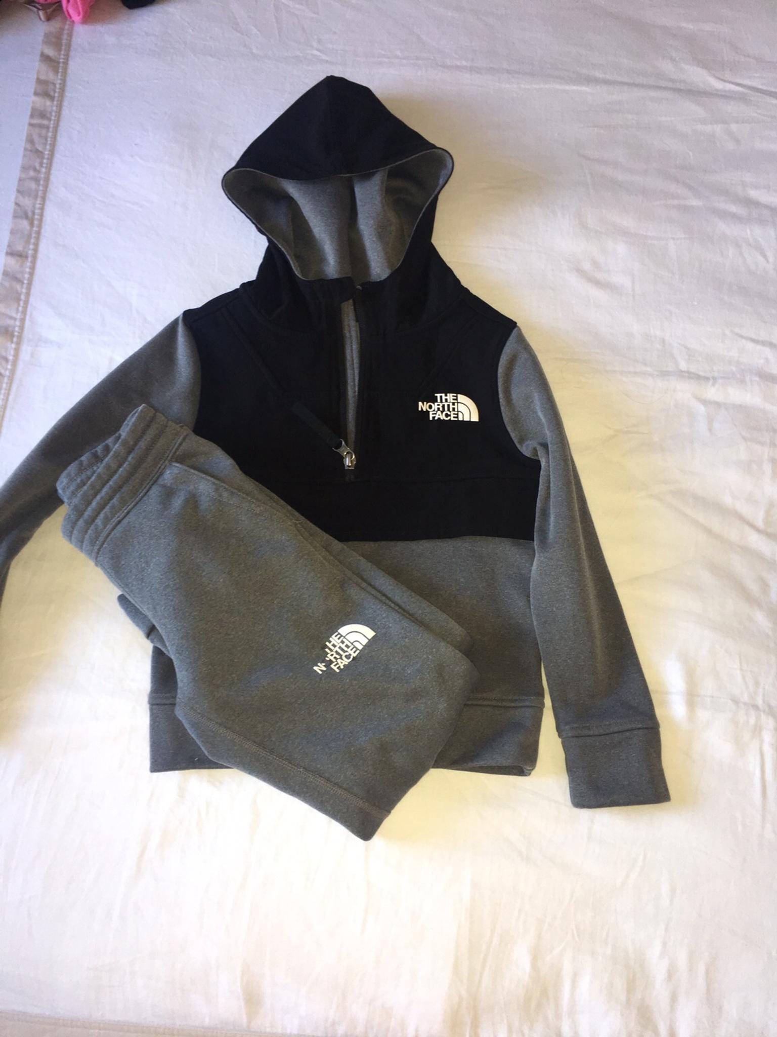 all black north face tracksuit