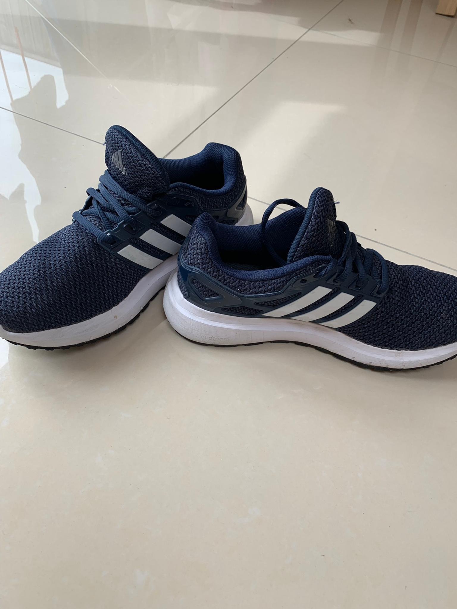 navy blue adidas trainers