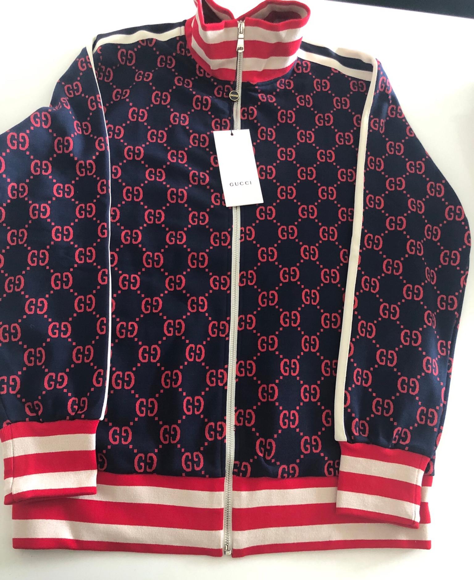 gucci tracksuit mens price
