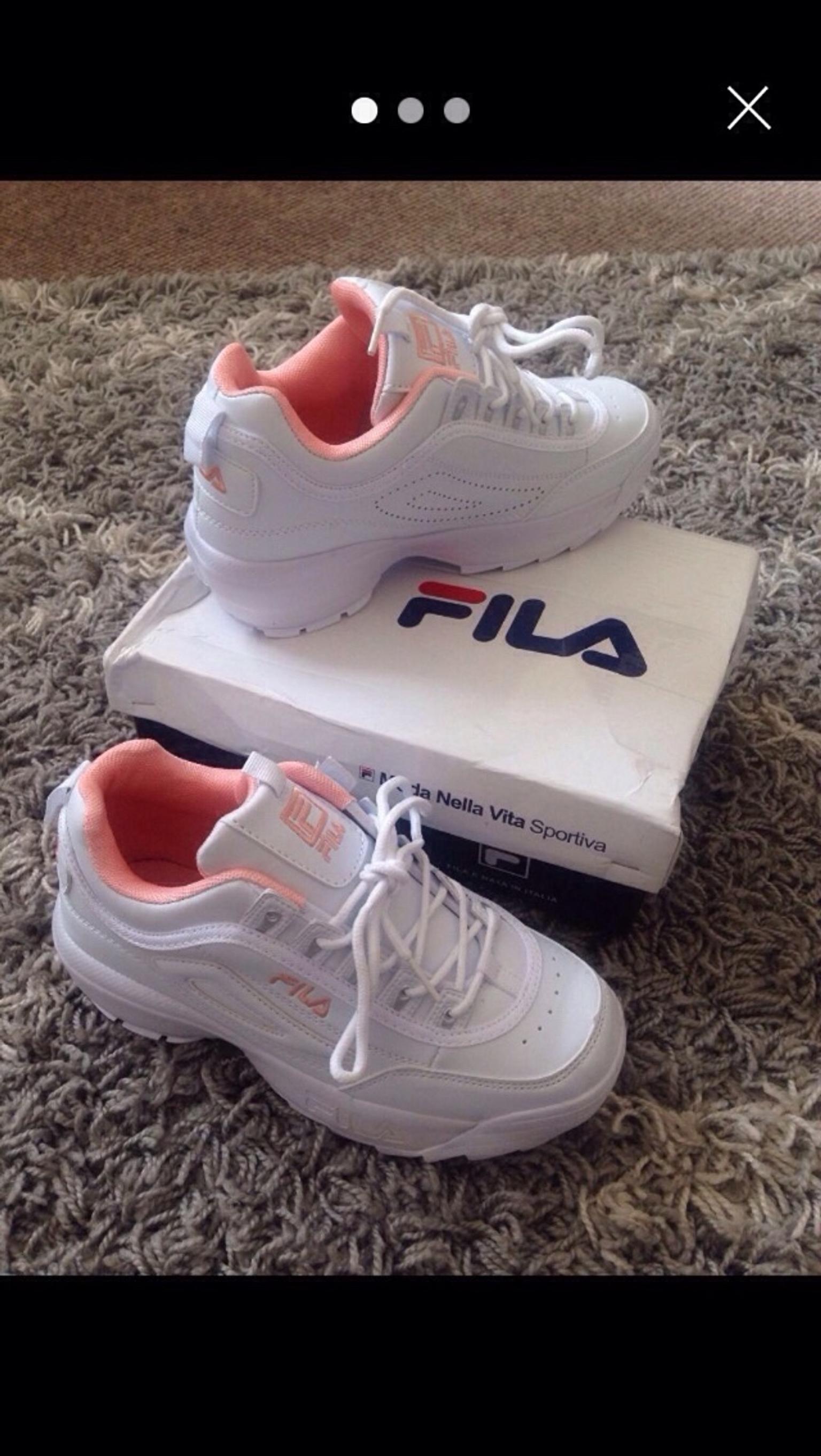 fila white and pink trainers