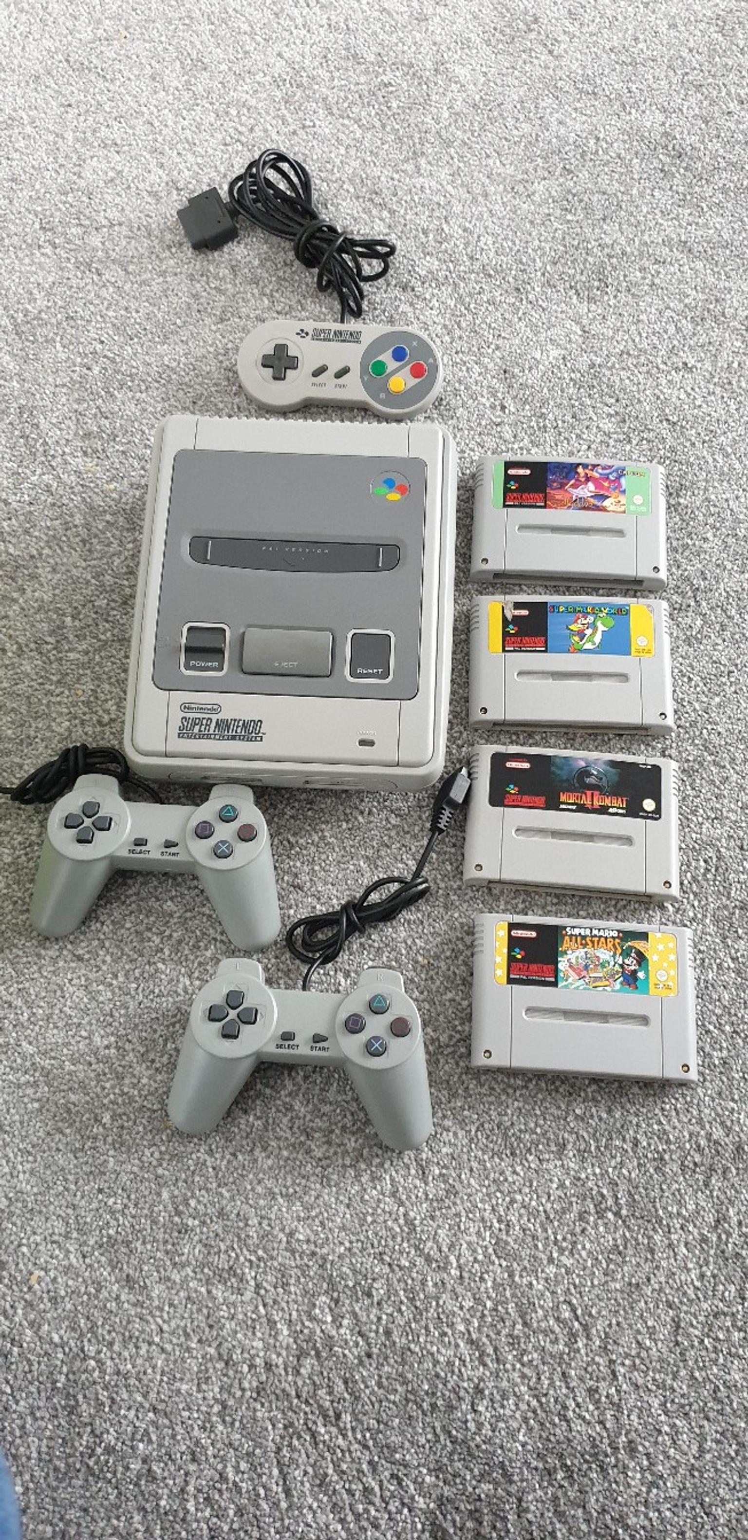 super nintendo console with games