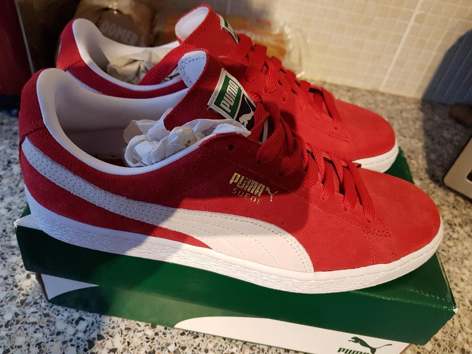 mens red puma trainers