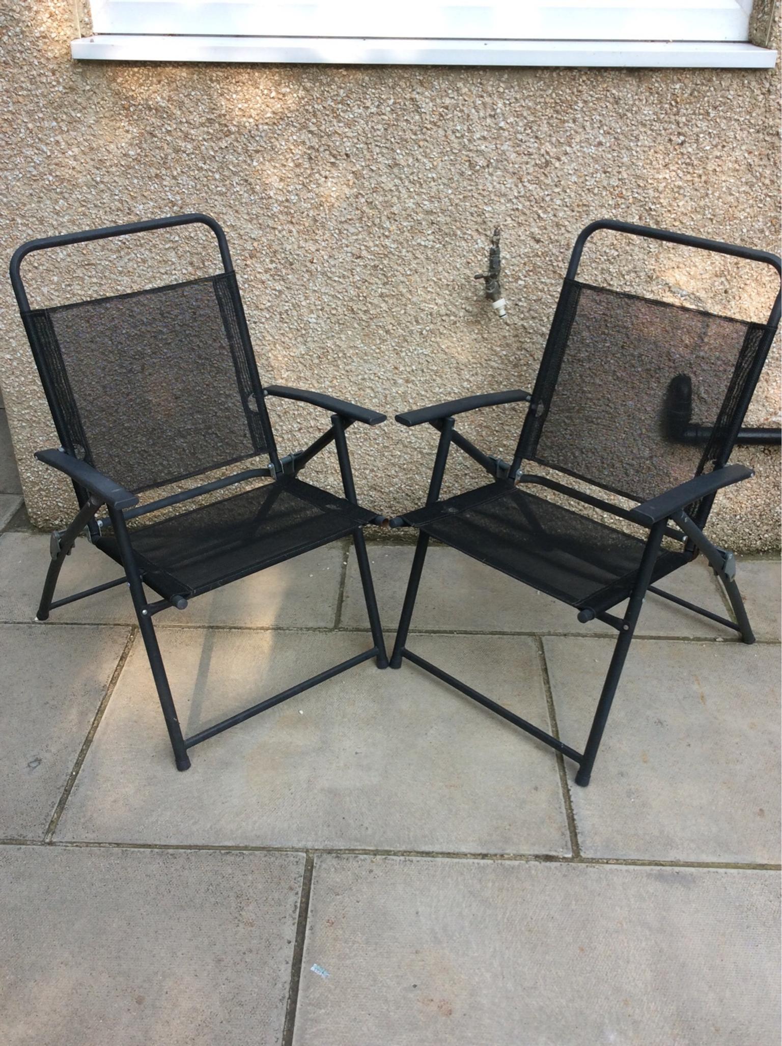 2 Black garden chairs ( fold up) in 