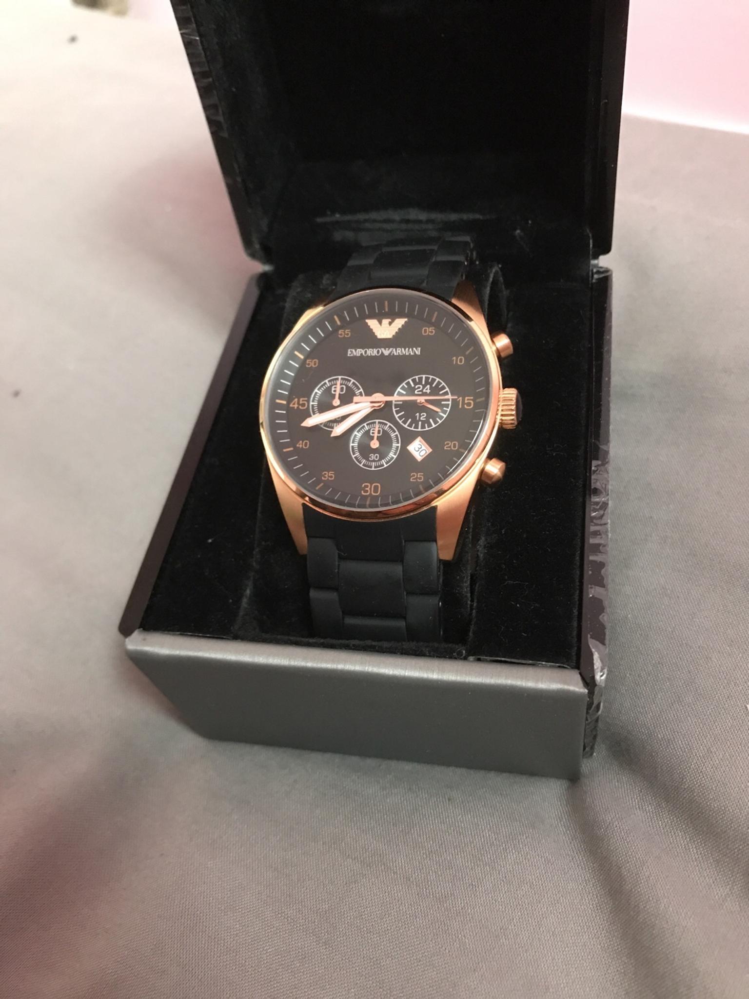 black and rose gold armani watch