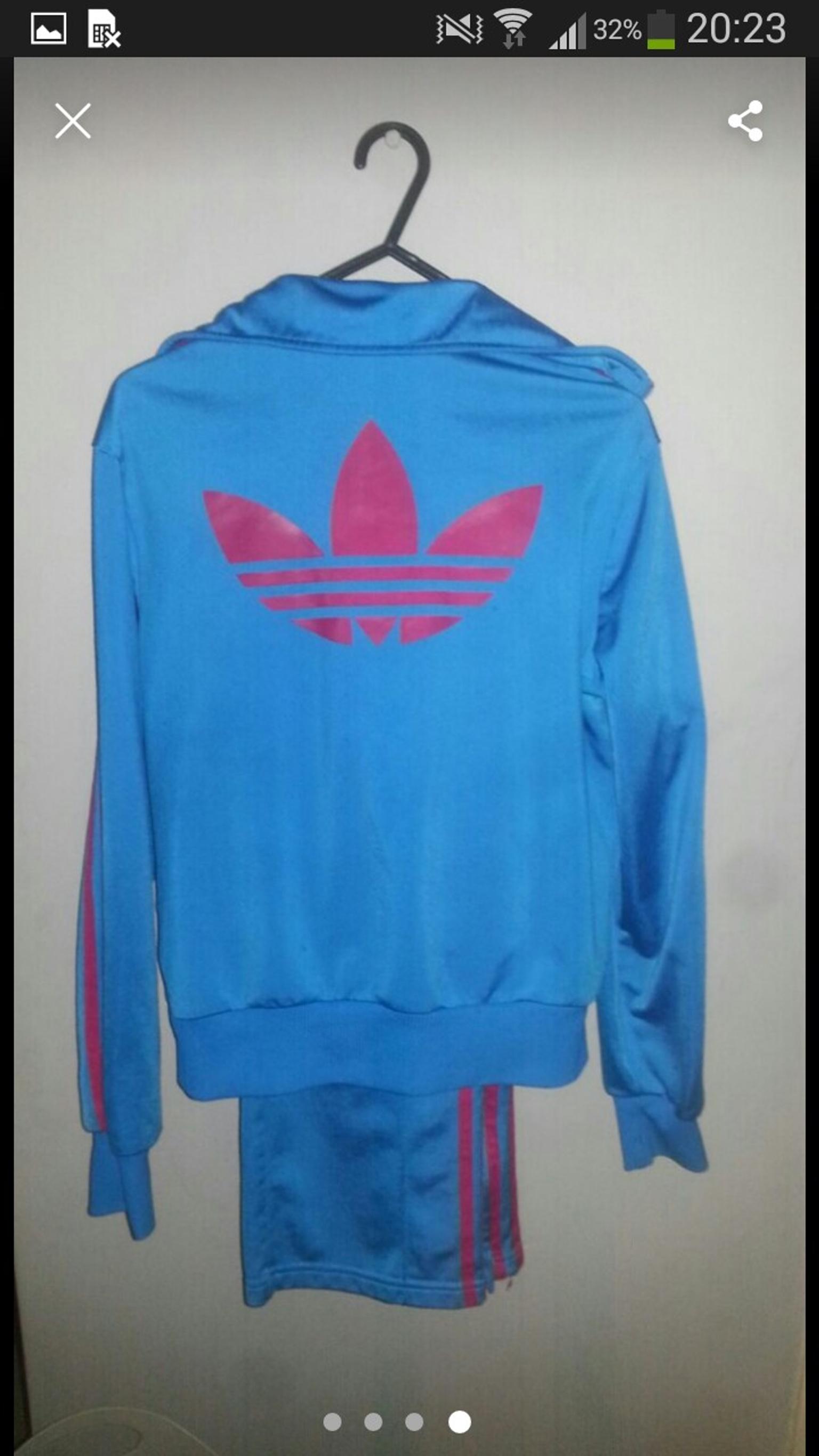 pink and blue adidas tracksuit