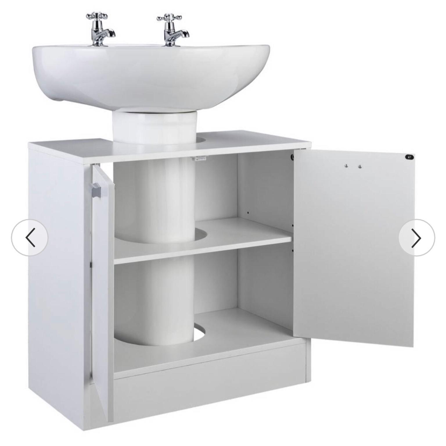 The Pedestal Sink Storage Cabinet Hammacher Schlemmer