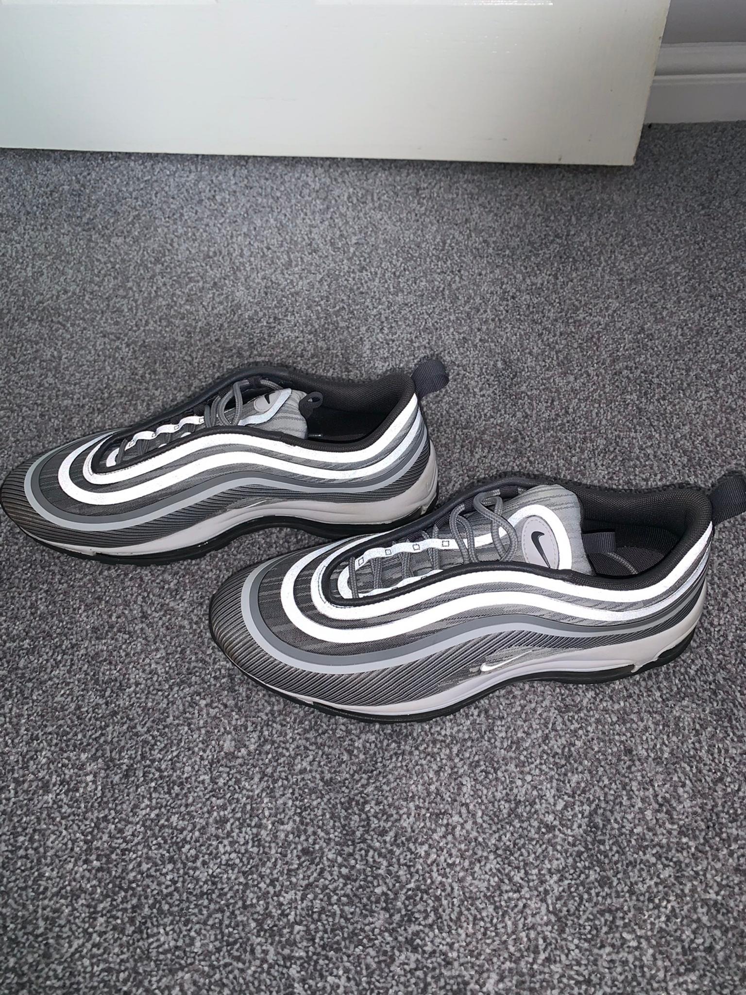 grey reflective 97s