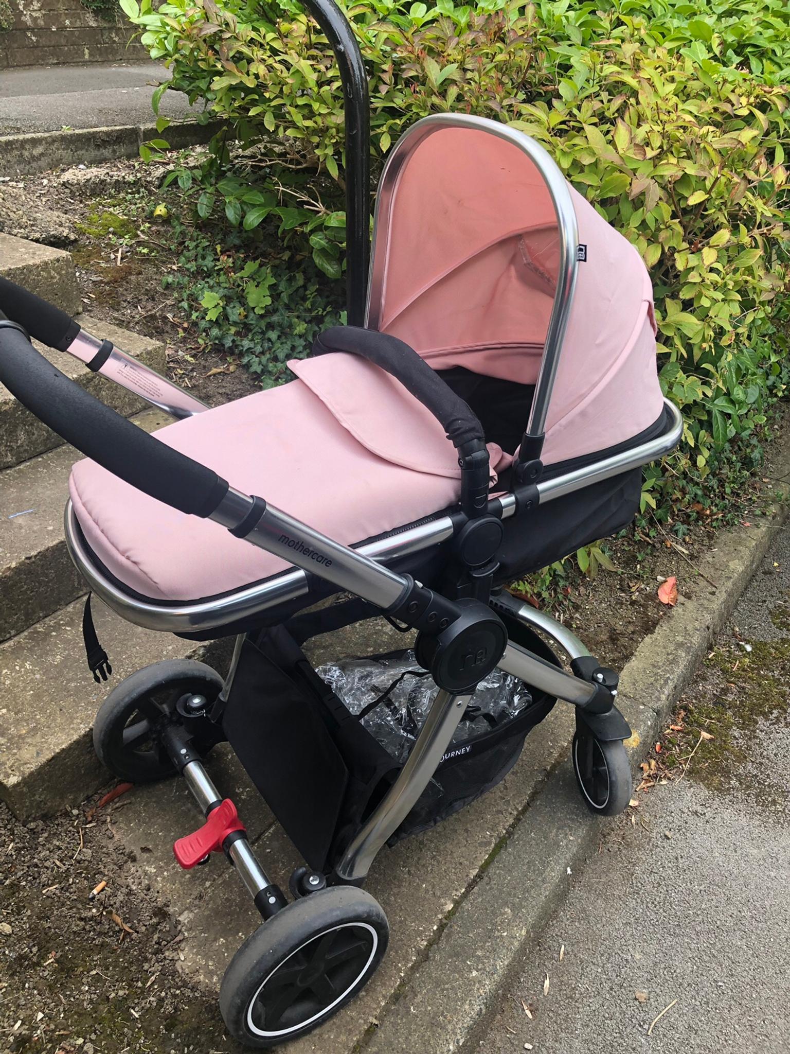 mothercare 4 wheel journey blush