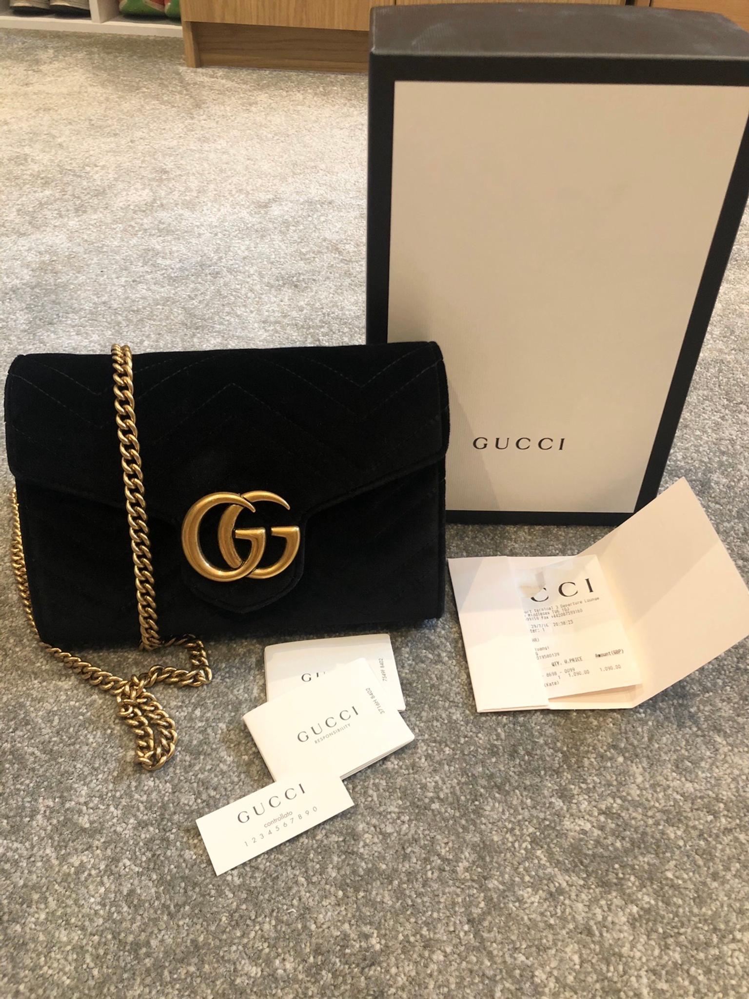 black gucci wallet on chain
