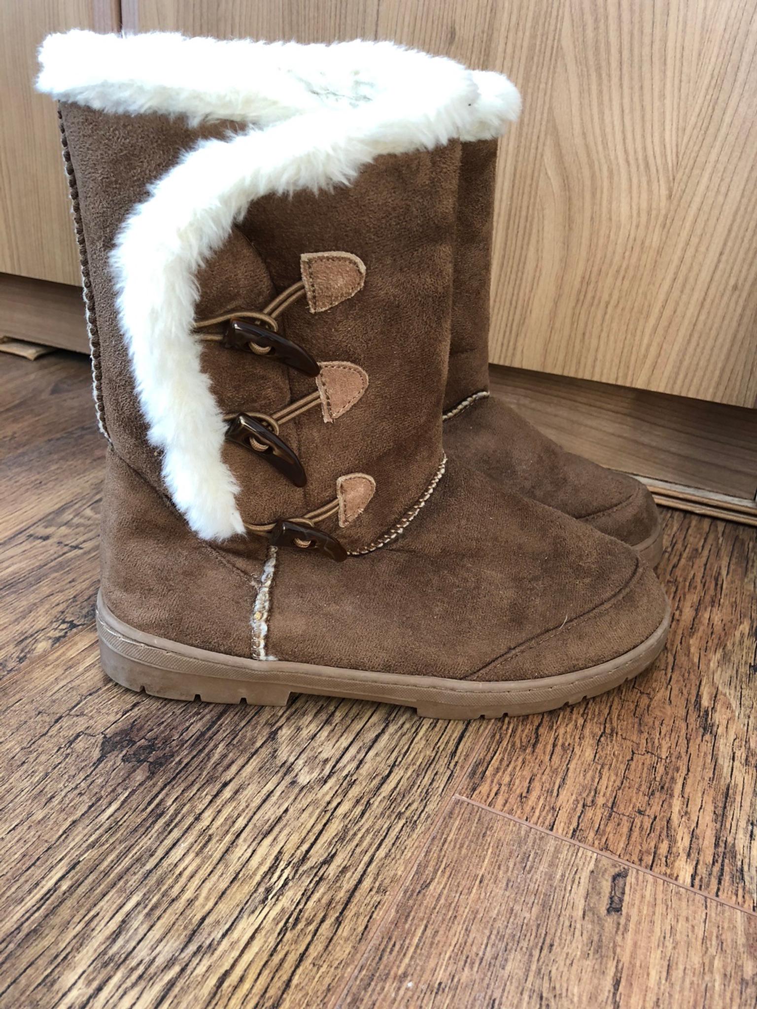 brown ugg style boots